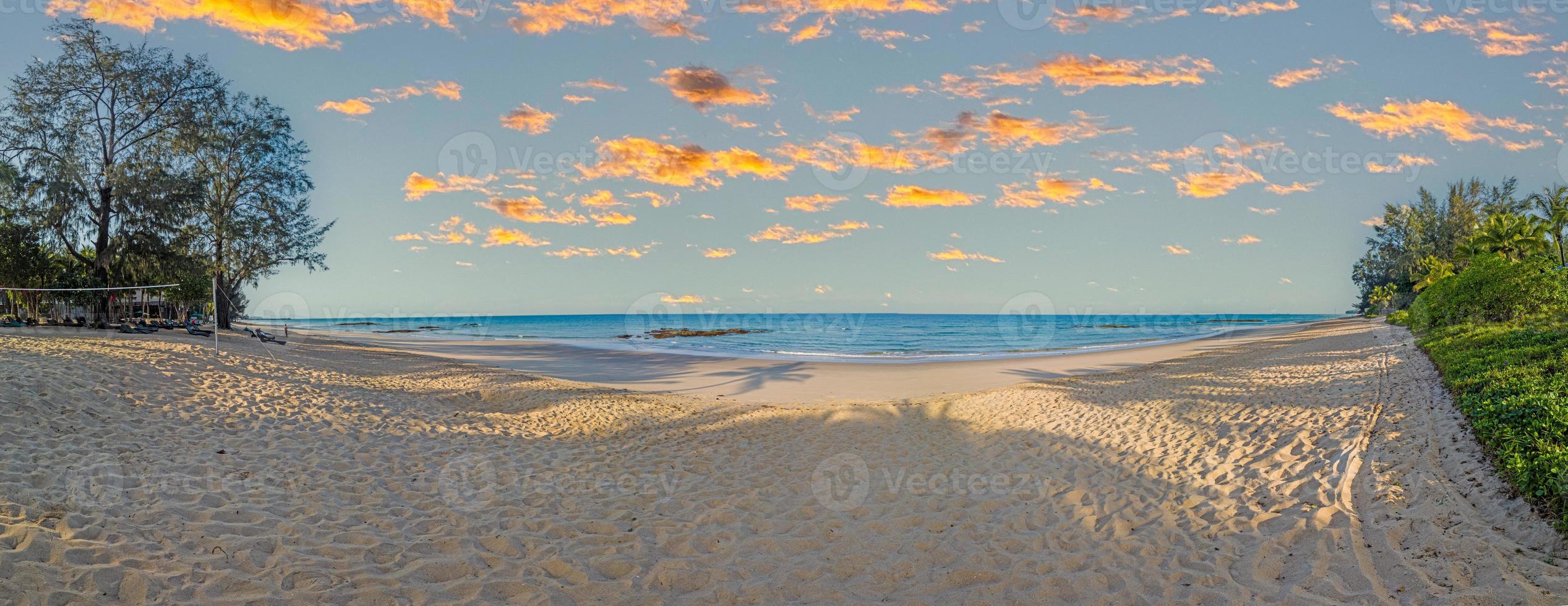 Picture of deserted Natai beach in Thailand during the day with white sand and turquoise blue water photo