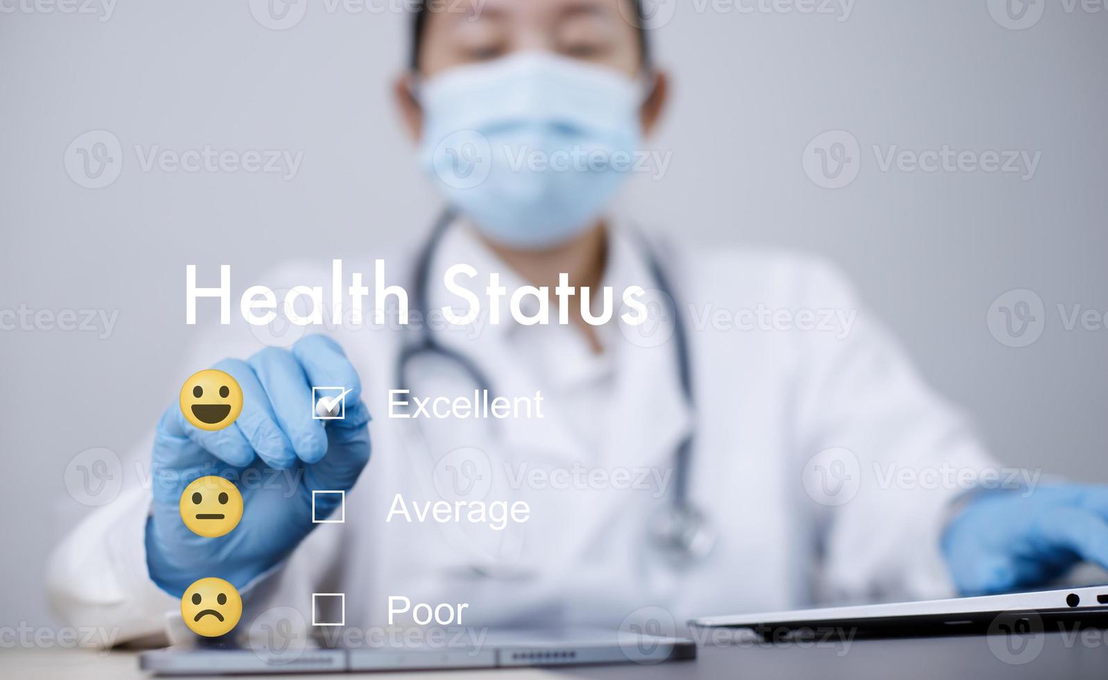 The Woman Doctor uses a pen checkbox for Health status excellence in the Health Status evaluation form, Hospital documents. Medical insurance forms, Doctor paperwork, Health Status concept photo