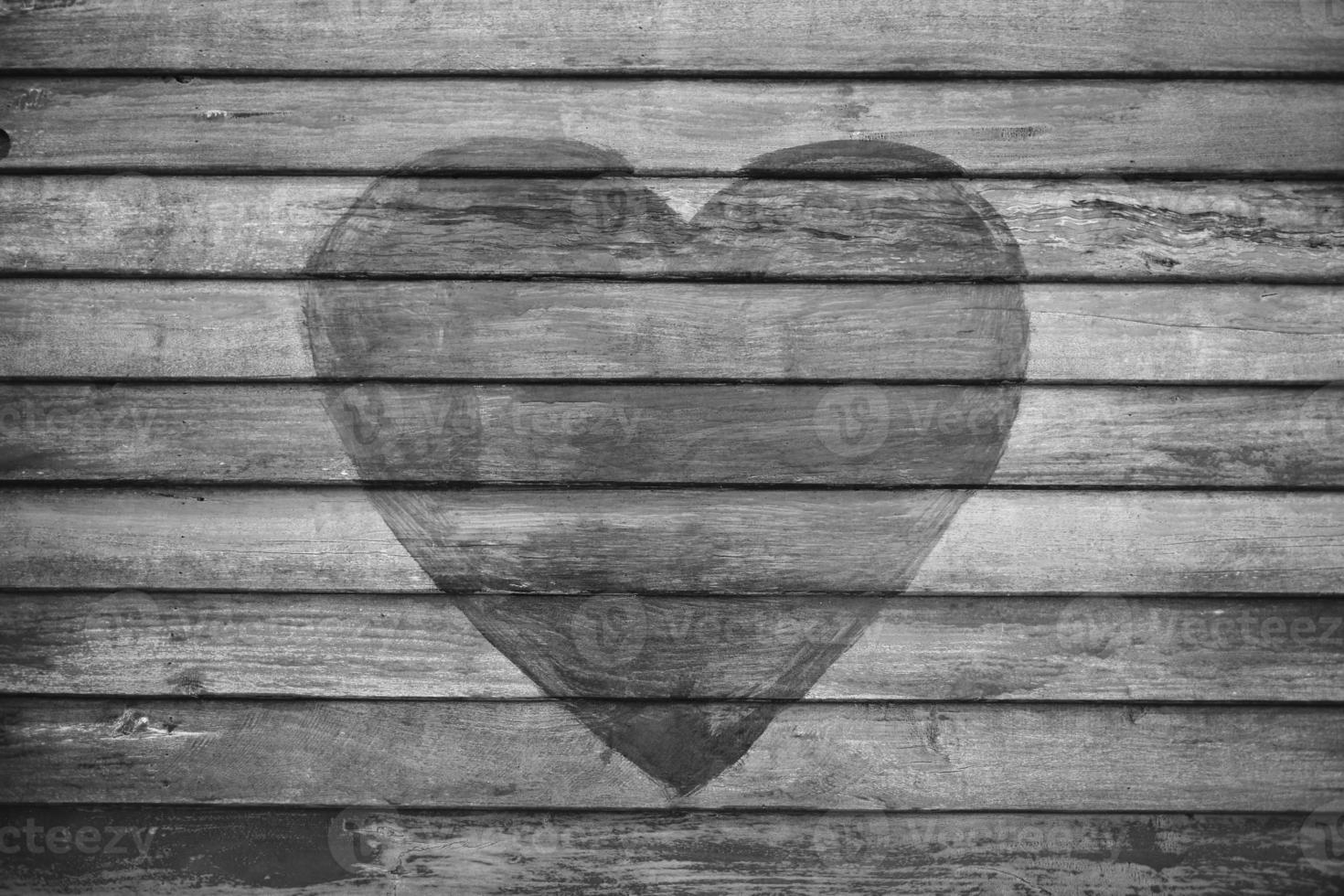 Heart shape on wooden Wall photo