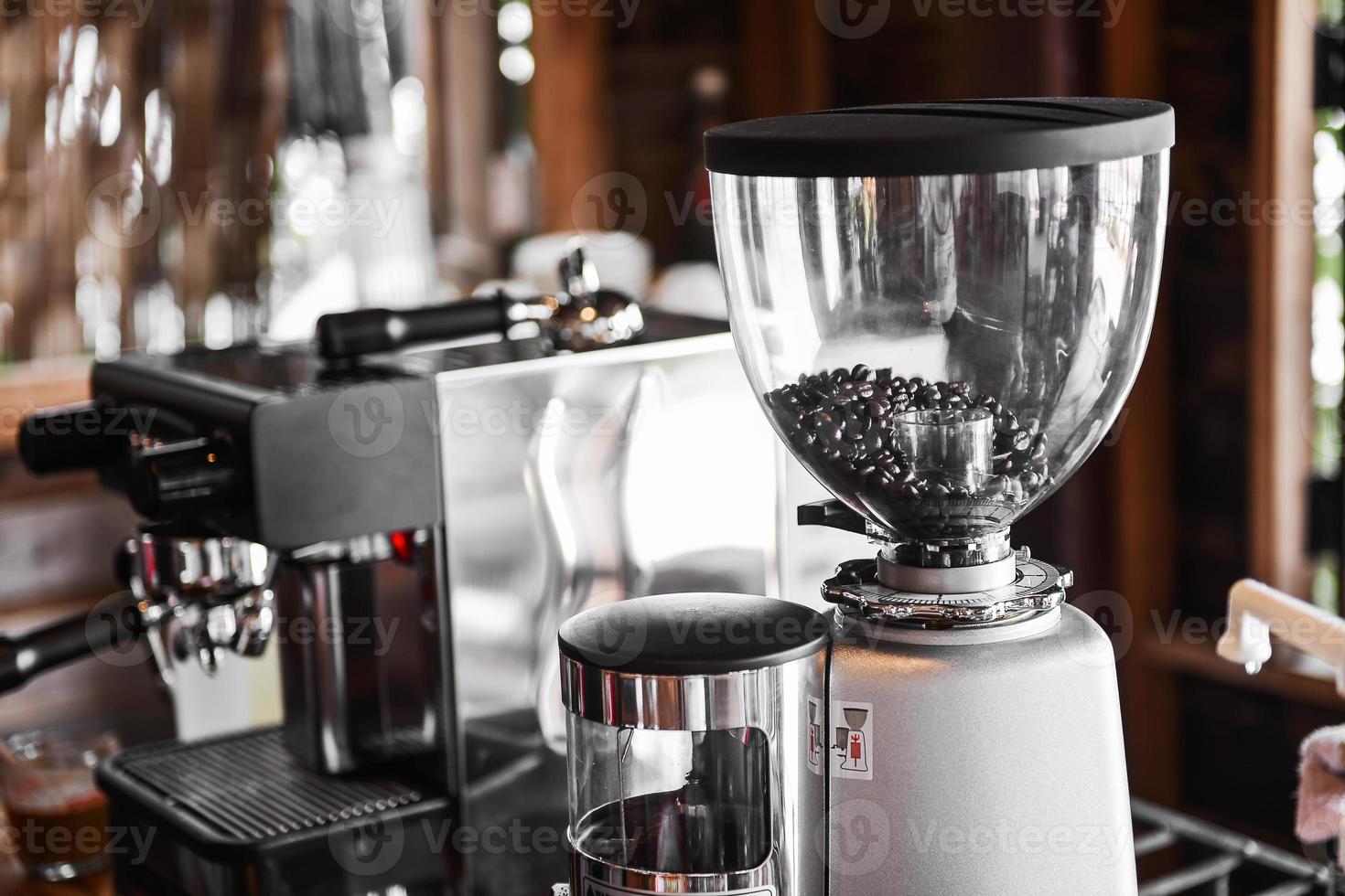 Coffee maker and coffee grinder  in coffee shop photo