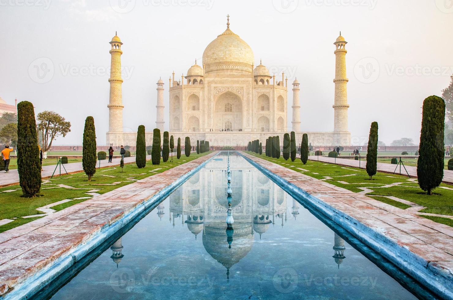 The Taj Mahal is an ivory-white marble mausoleum on the south bank of the Yamuna river in the Indian city of Agra, Uttar Pradesh. photo