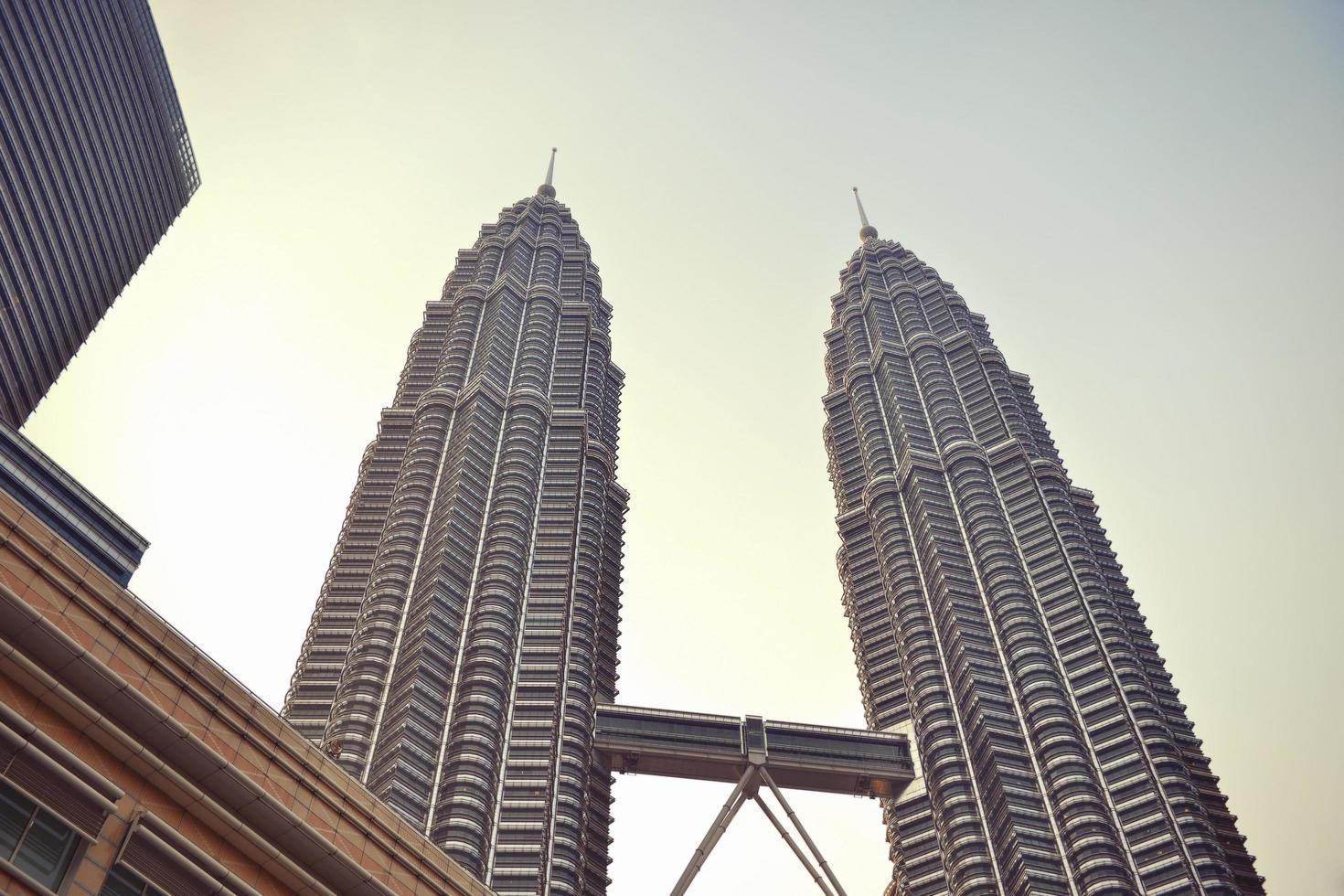 KUALA LUMPUR, MALAYSIA - July 22-Petronas Twin Towers on July 22, 2014 in Kuala Lumpur, Malaysia. photo