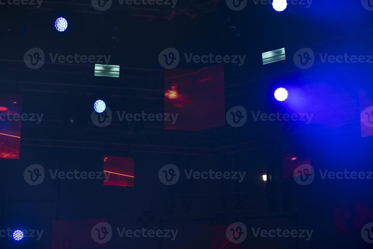 Stage lighting on a dark blue background. photo