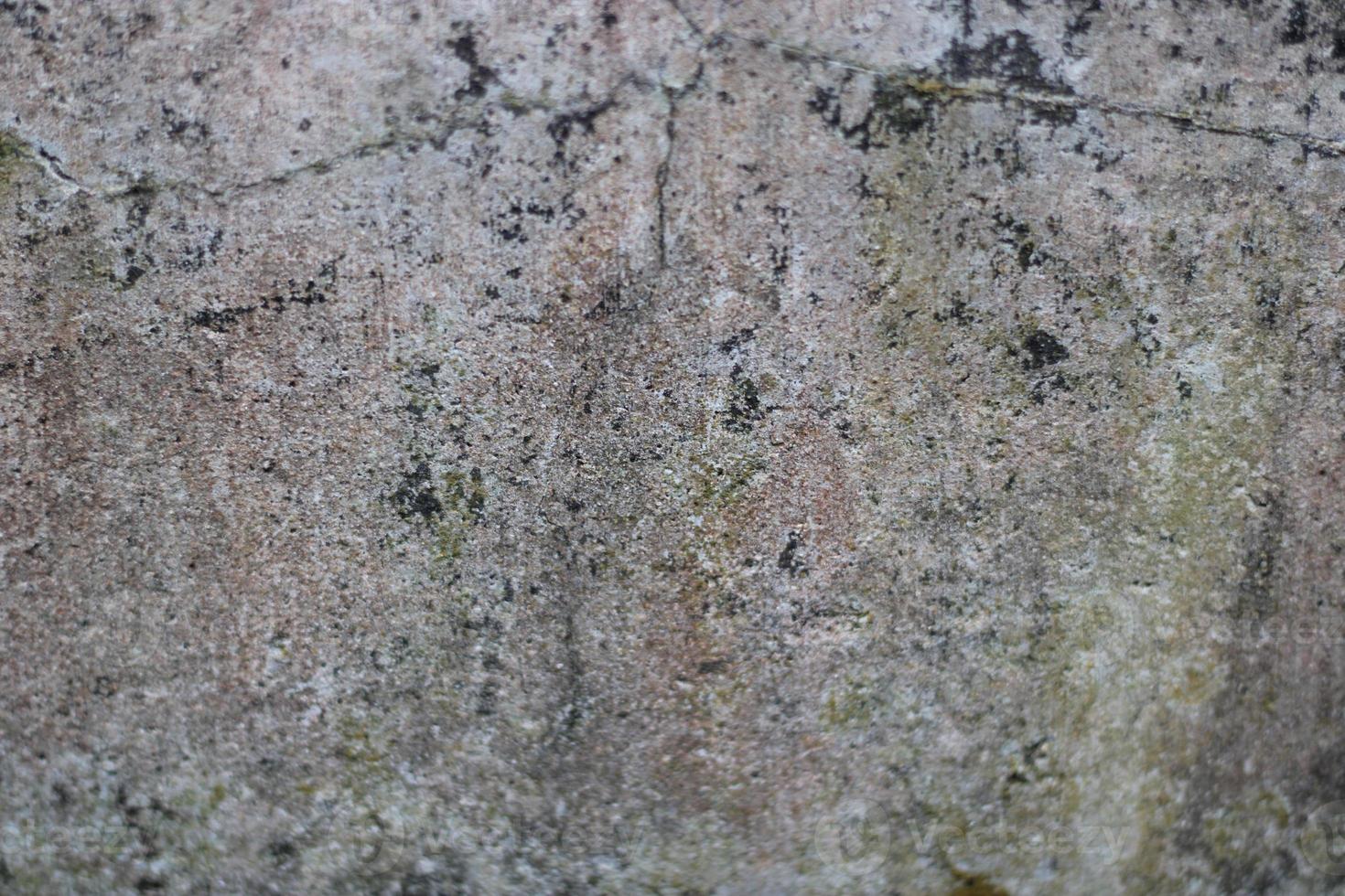 photo of red wall texture with cement on the wall