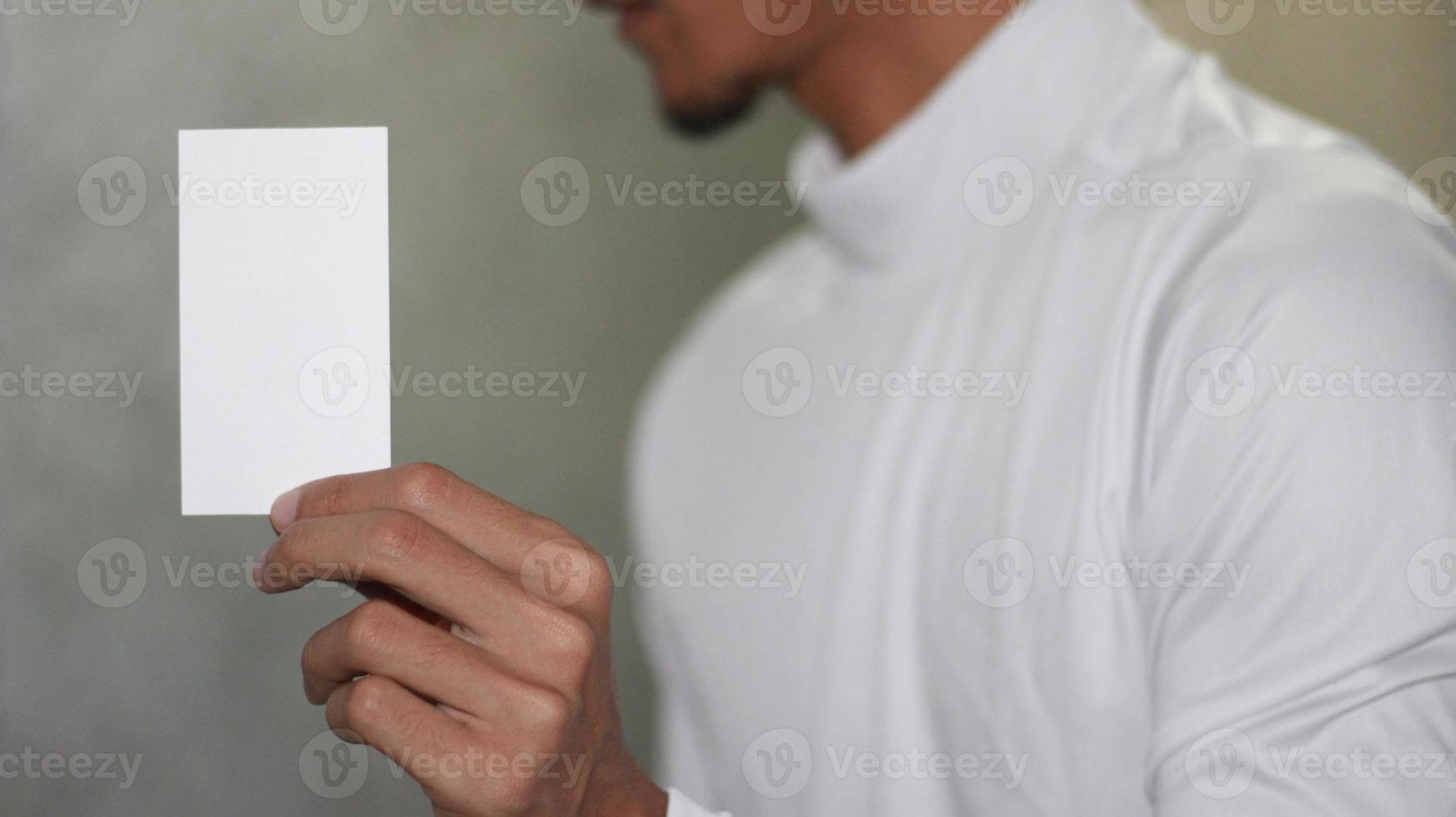 photo of blank white card in hand