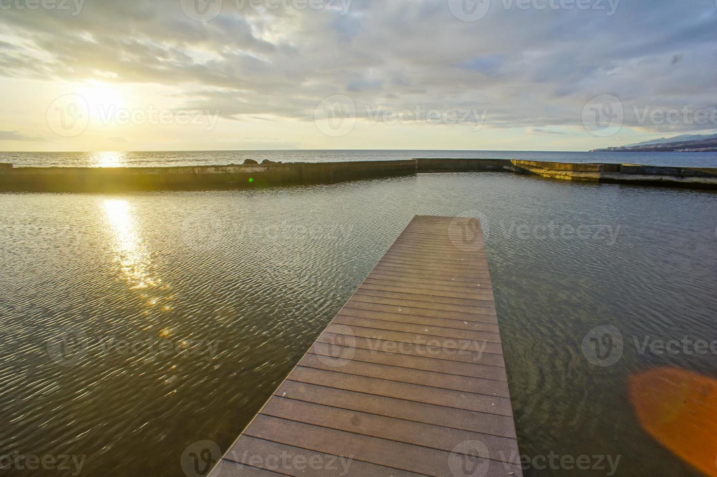 Pier over Atlantic Ocean in Tenerife Canary Islands Spain photo