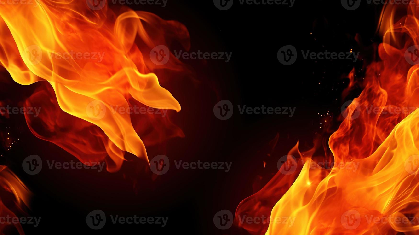 Fire flames on black background. Closeup of fire flames isolated on black background. photo