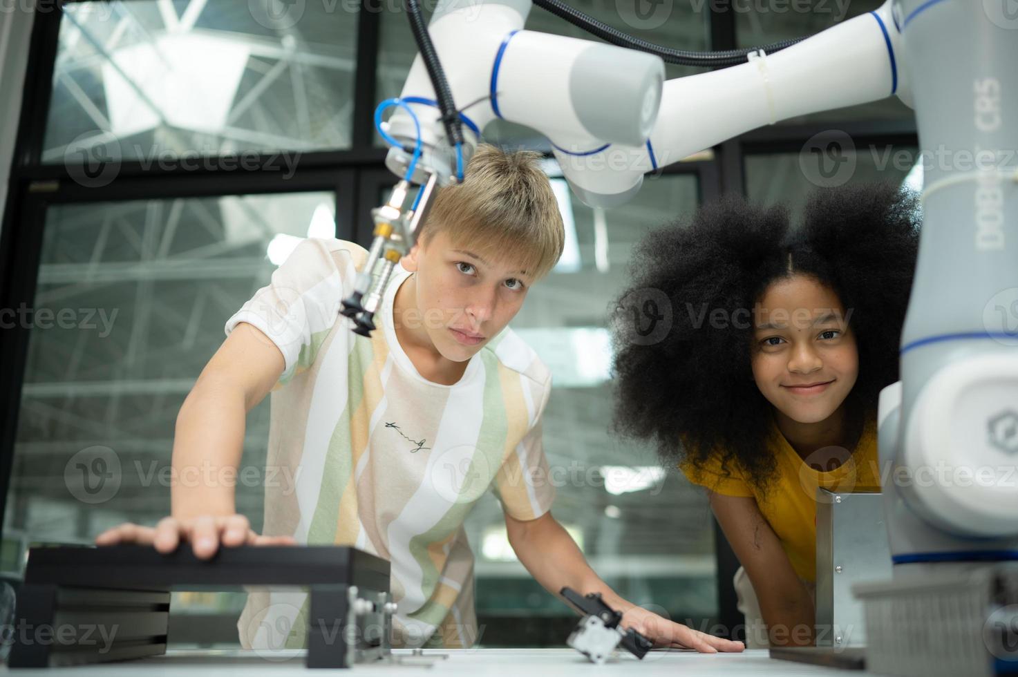 Children using the hand robot technology, Students are studying technology, which is one of the STEM courses. photo