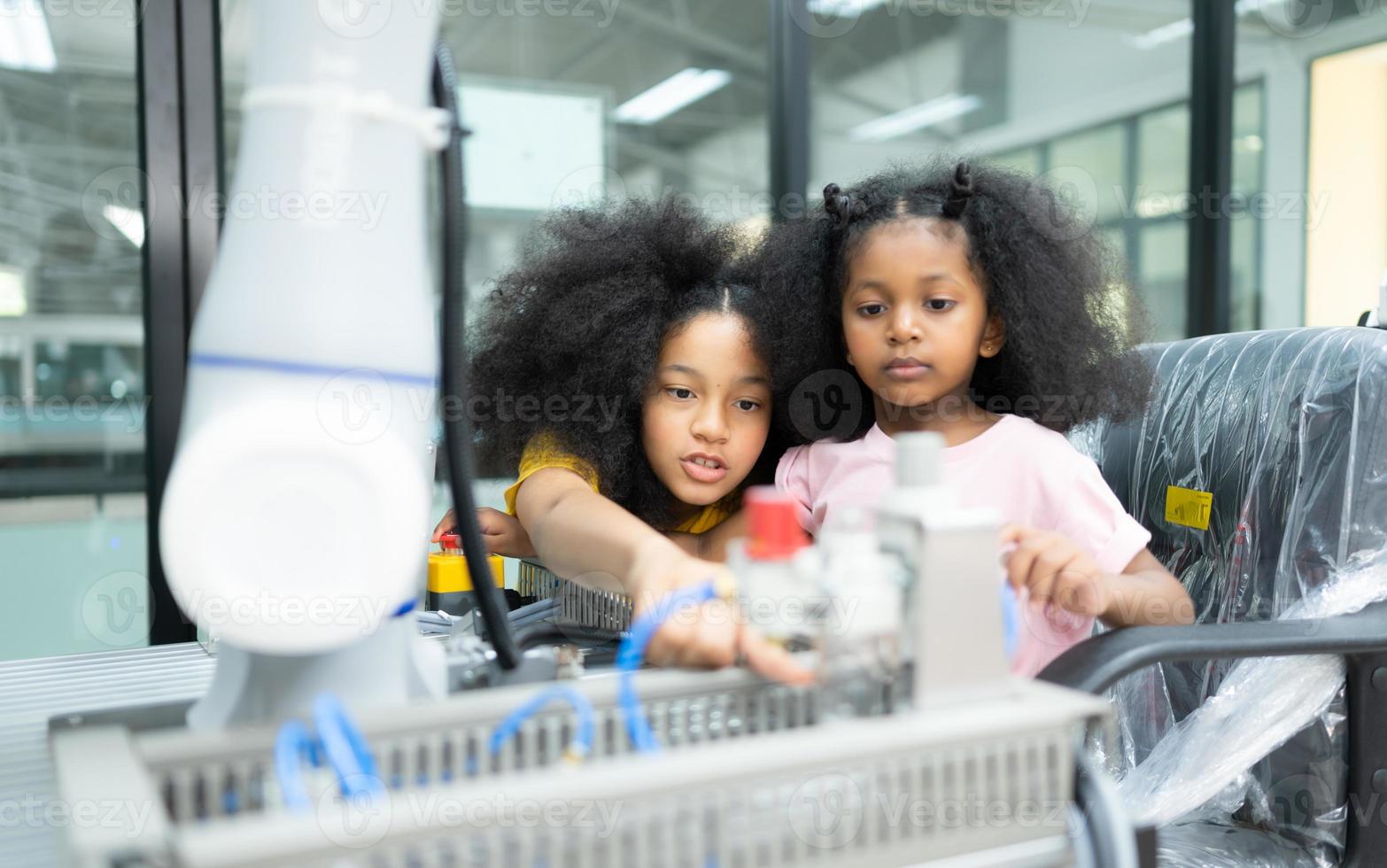 Children using the hand robot technology, Students are studying technology, which is one of the STEM courses. photo