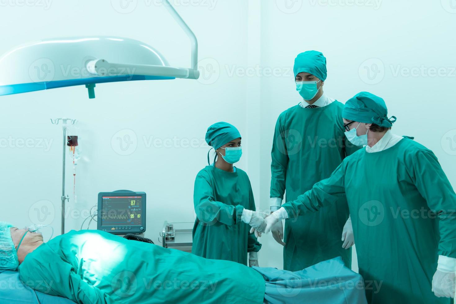 Achievements of medical professors in the field of cardiology and medical teams in the heart transplantation room photo