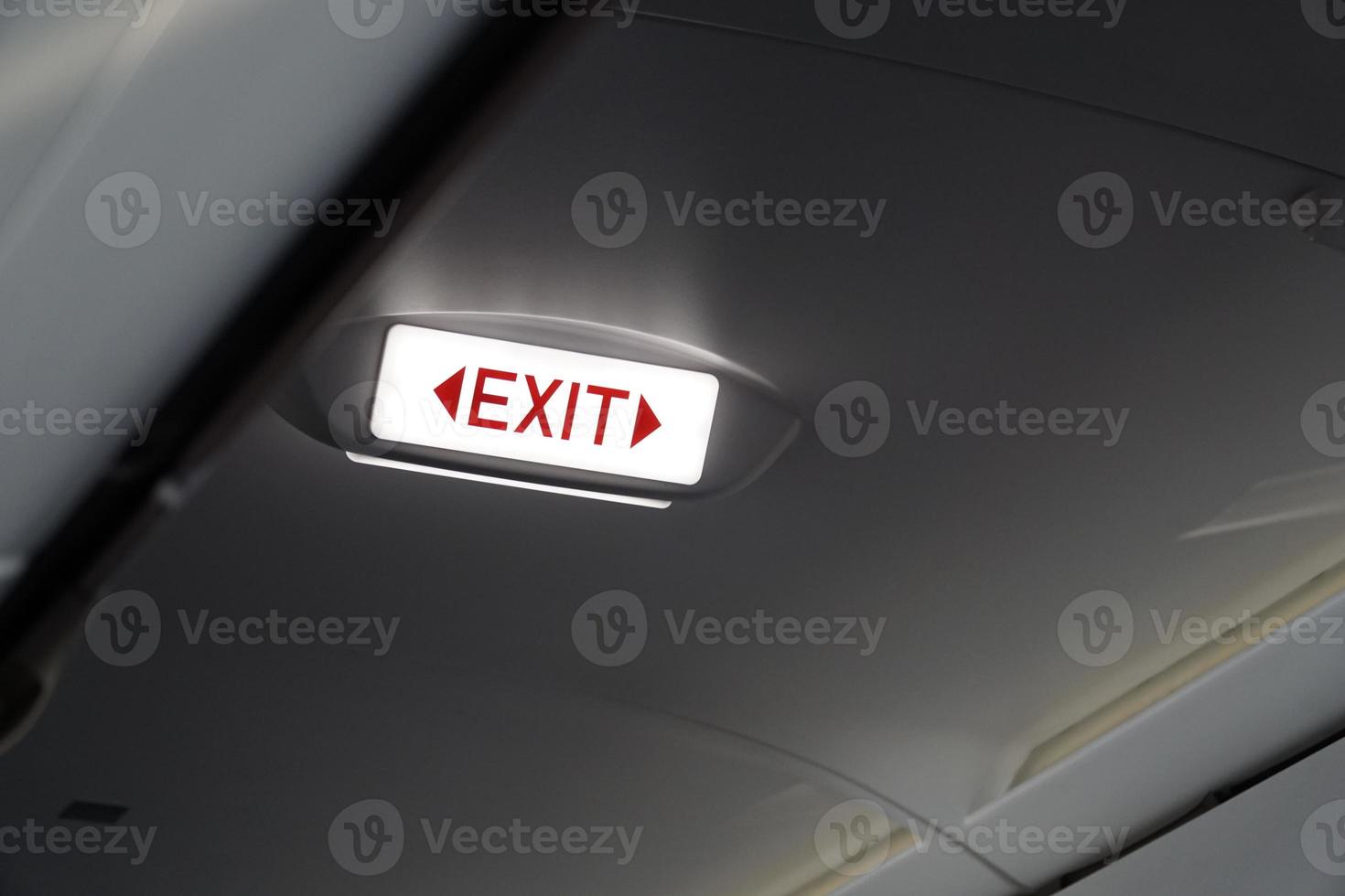 Emergency Exit Sign inside an Airplane photo