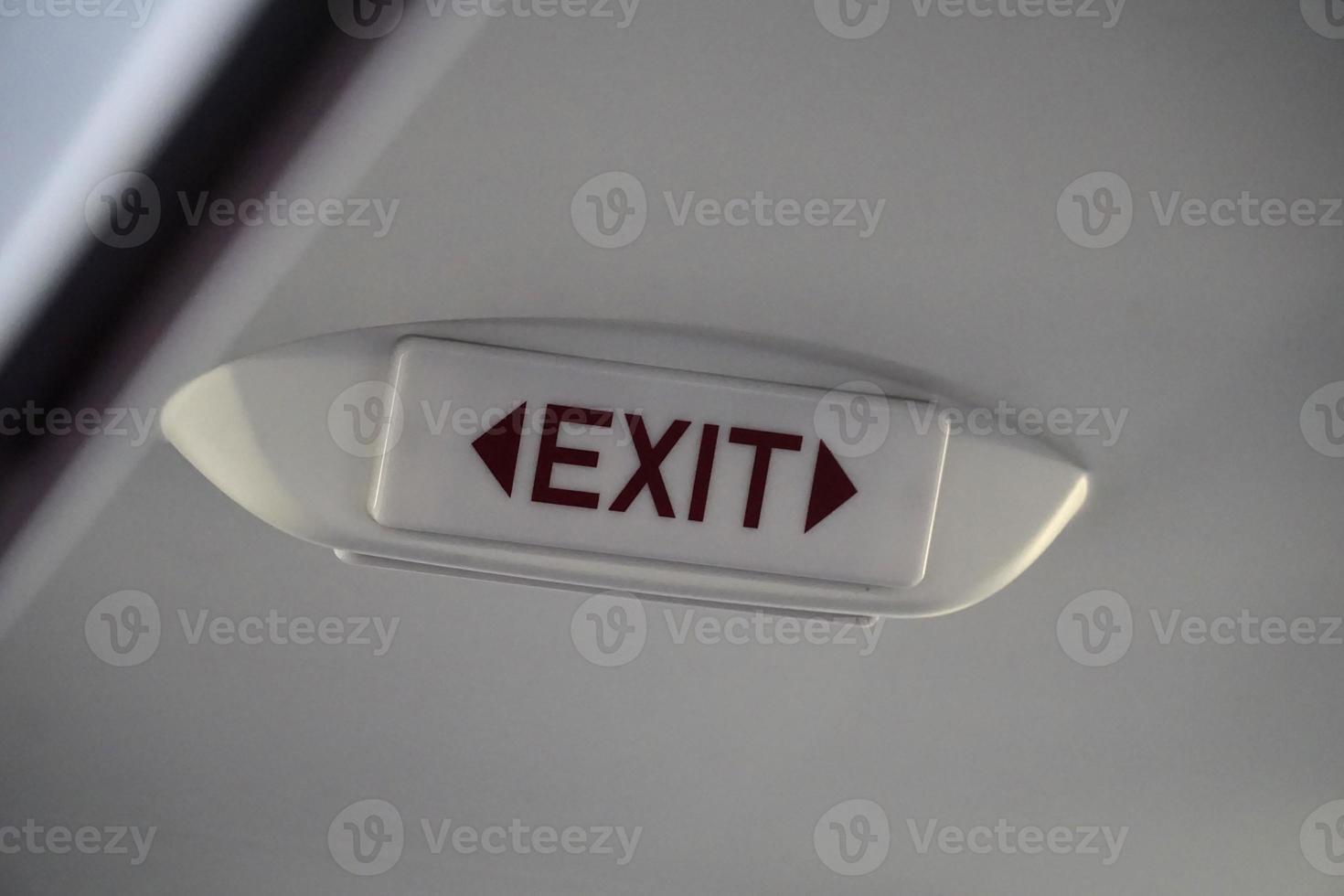 Emergency Exit Sign Inside an Airplane photo