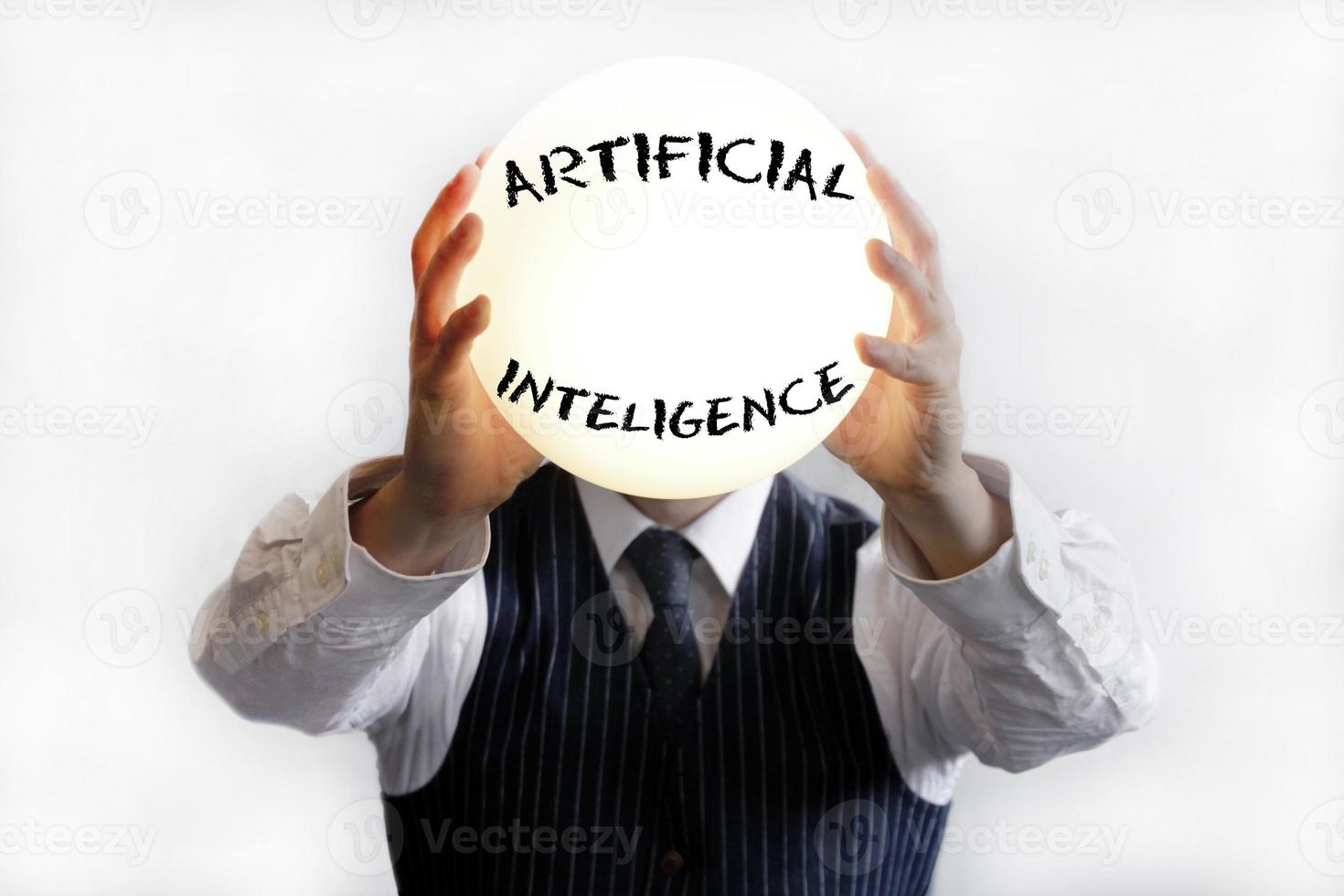 Businessman with a big shiny lamp instead of a head, with the word Artificial Intelligence written on it photo