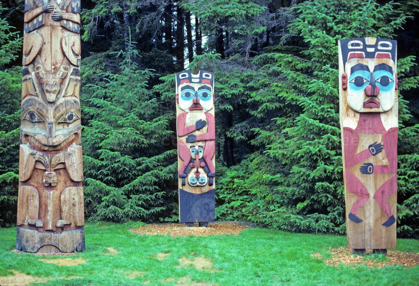 Totem poles in Alaska photo