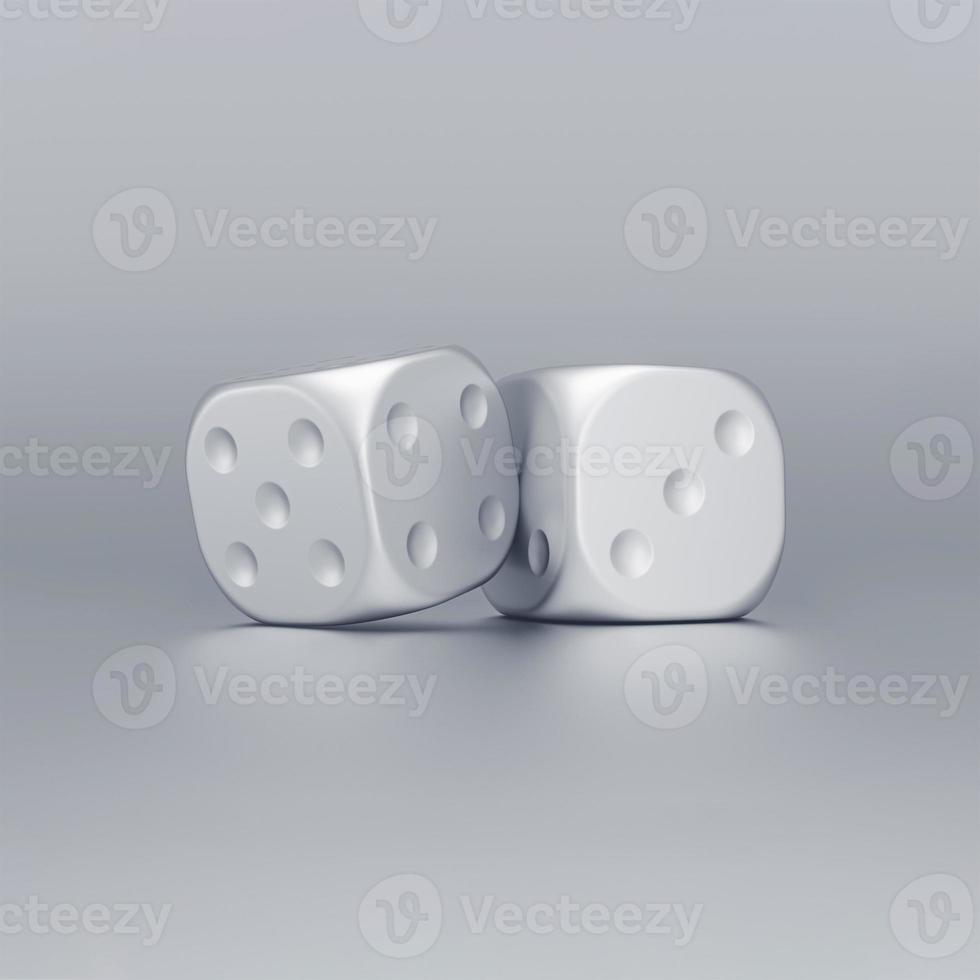 Silver dice on on grey background. Lucky game or random concept. photo