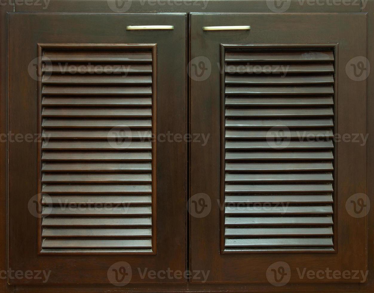 Dark Wooden Cabinet Doors Background photo