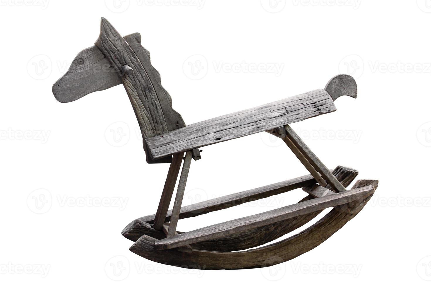 Wooden rocking horse isolated on white with clipping path photo