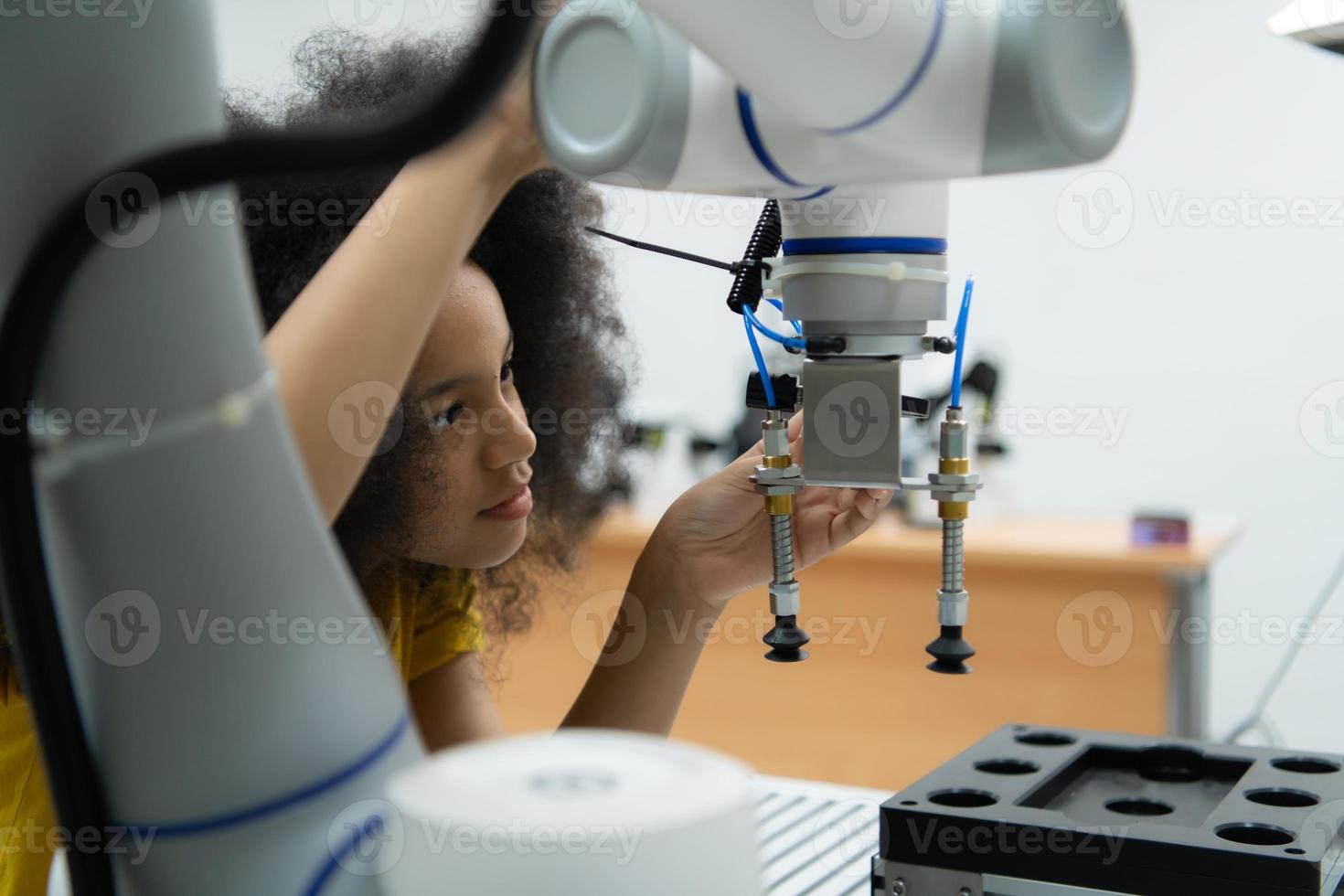 Children using the hand robot technology, Students are studying technology, which is one of the STEM courses. photo