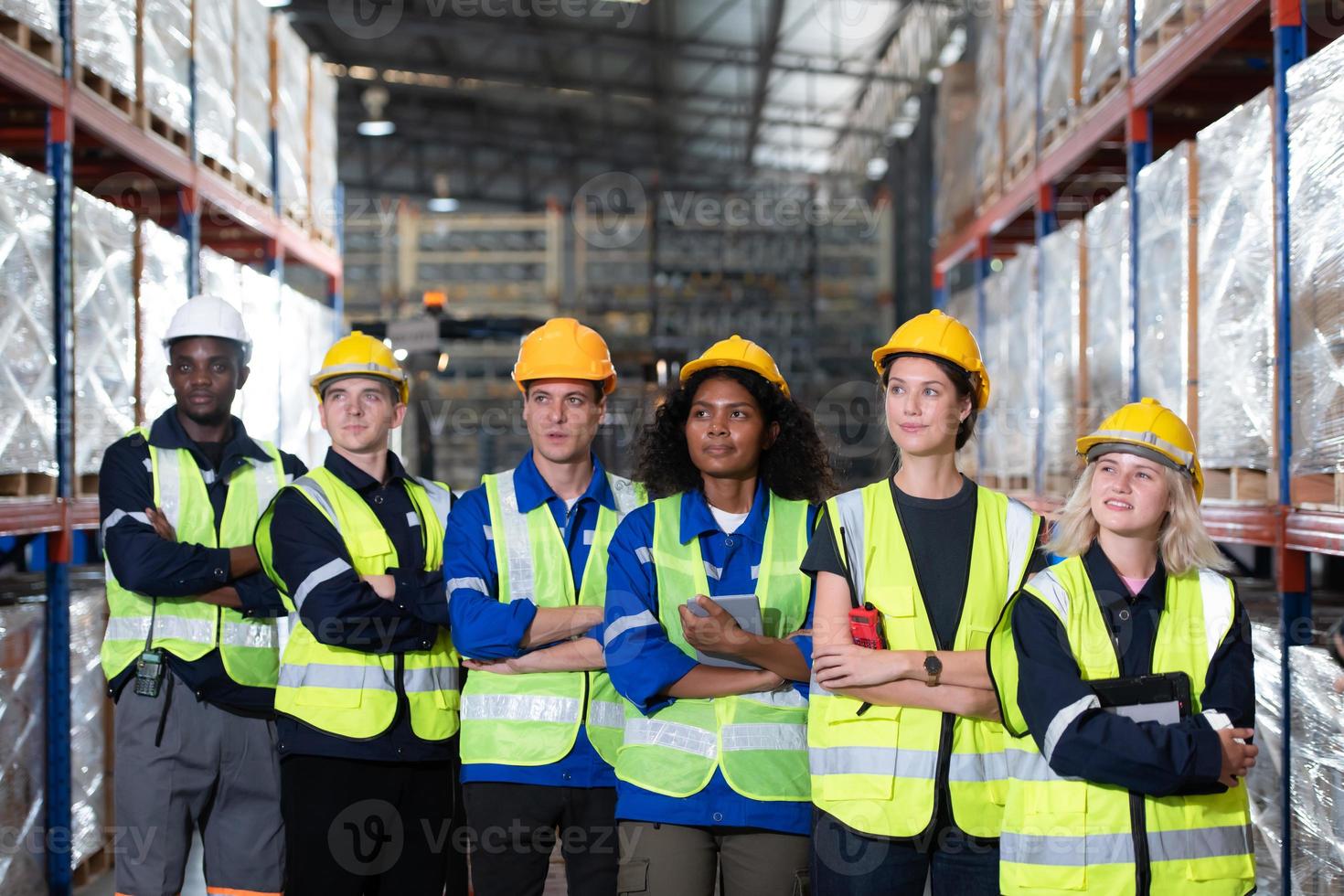 Portrait of worker in an auto parts warehouse, Relax after examine auto parts that are ready to be shipped to the automobile assembly factory. photo