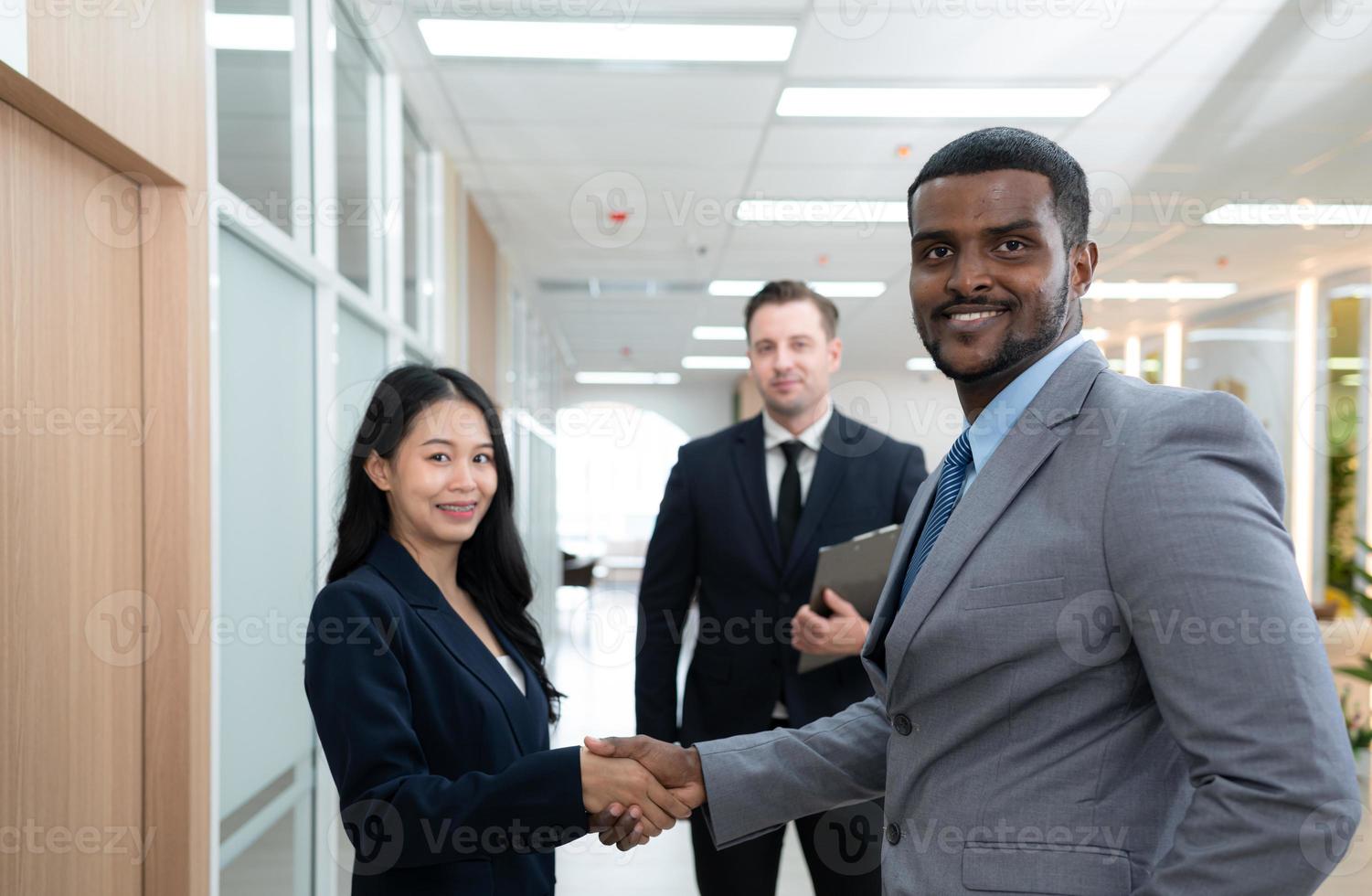 Handshake shows cooperation, achievements, congratulations or even greetings. Can be used in all occasions among business people photo