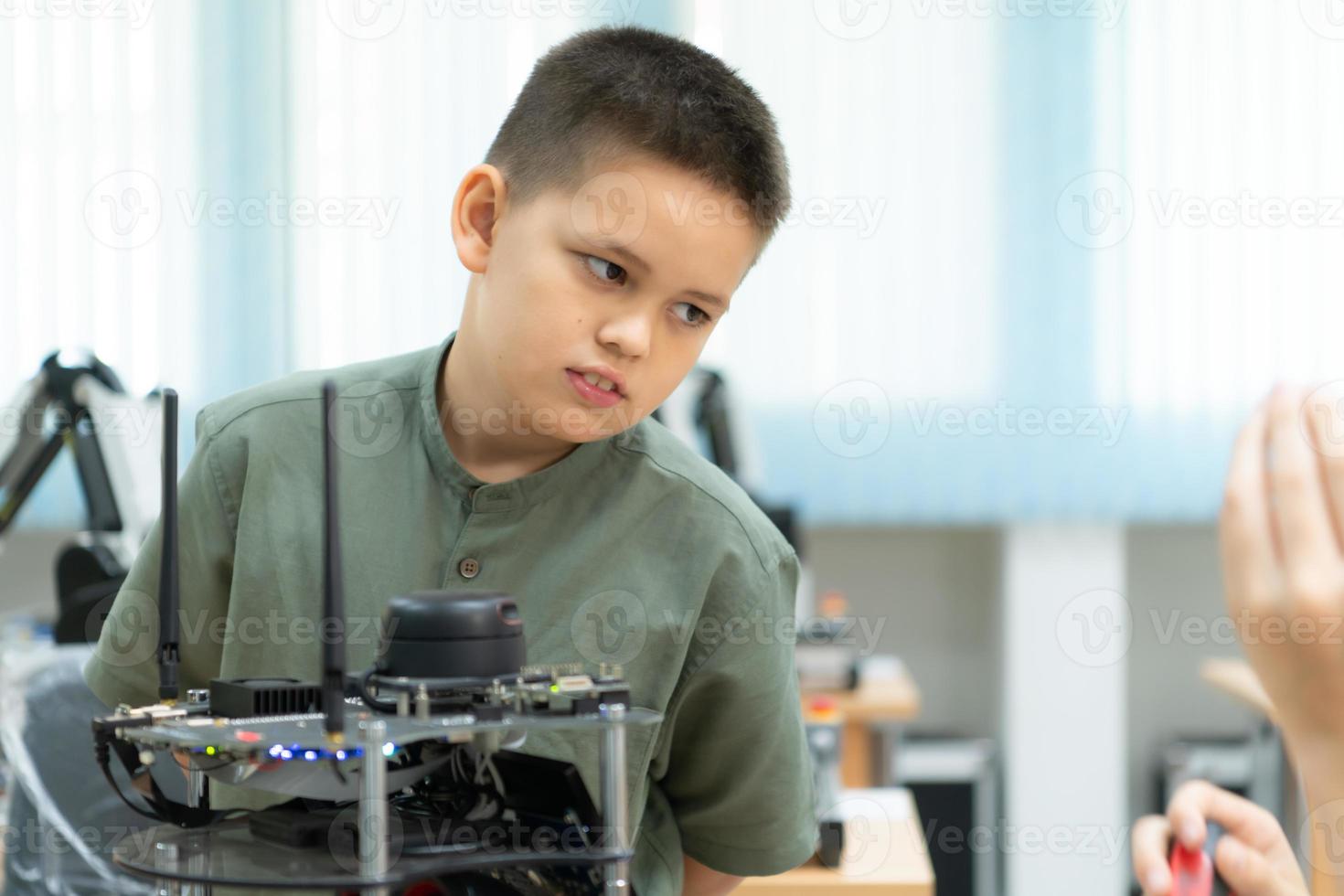 Children using the hand robot technology, Students are studying technology, which is one of the STEM courses. photo