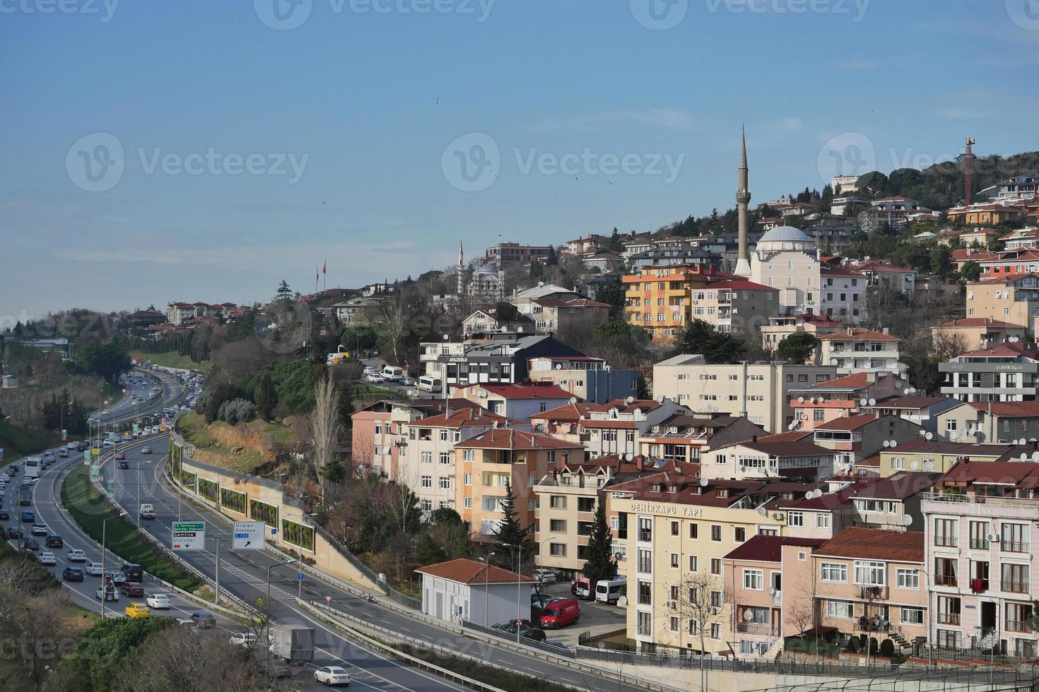istanbul city buildings and mosques against blue sky photo