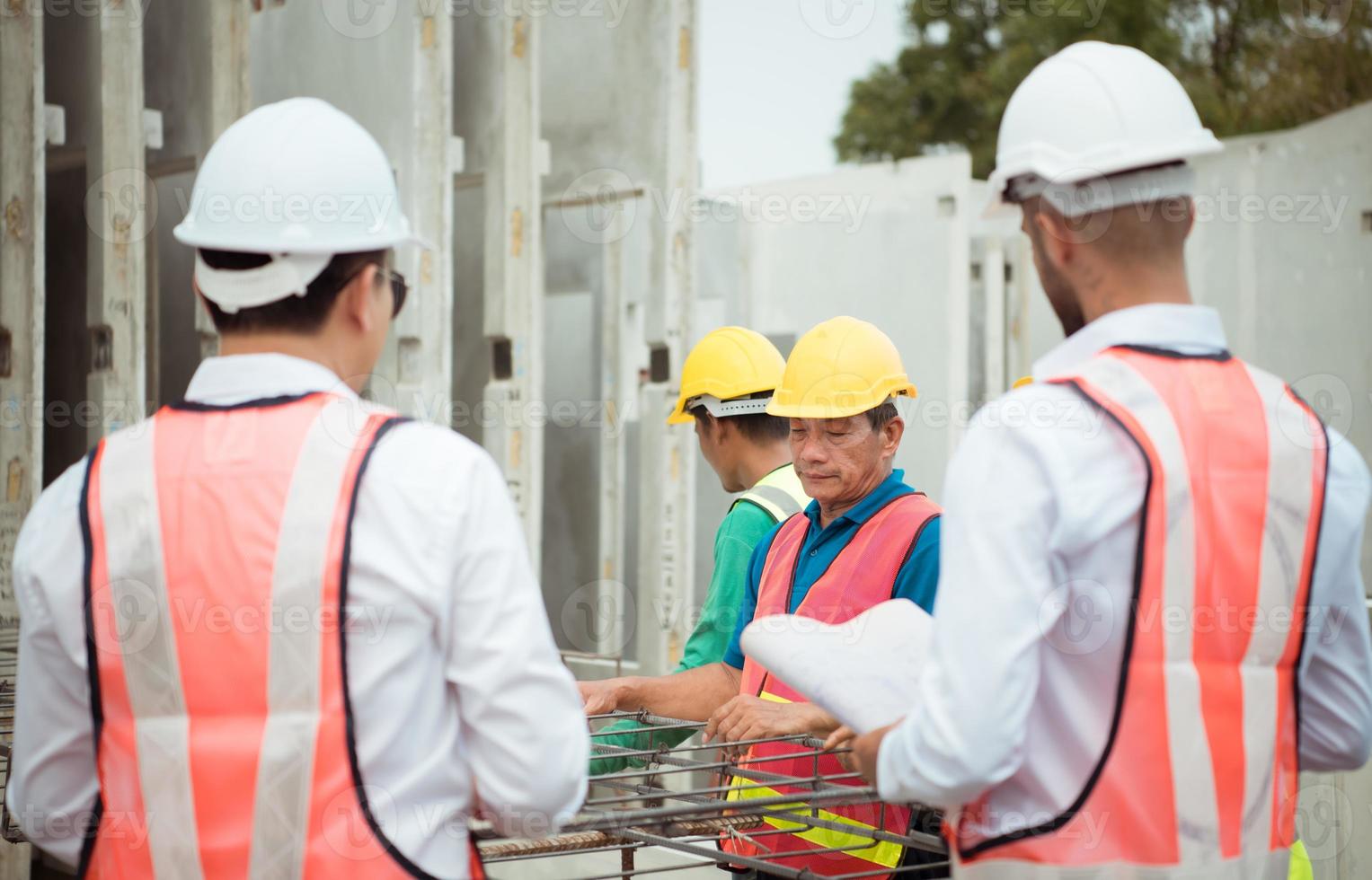 Construction engineer and construction foreman Monitor the progress and supervise important construction works on the construction site. photo