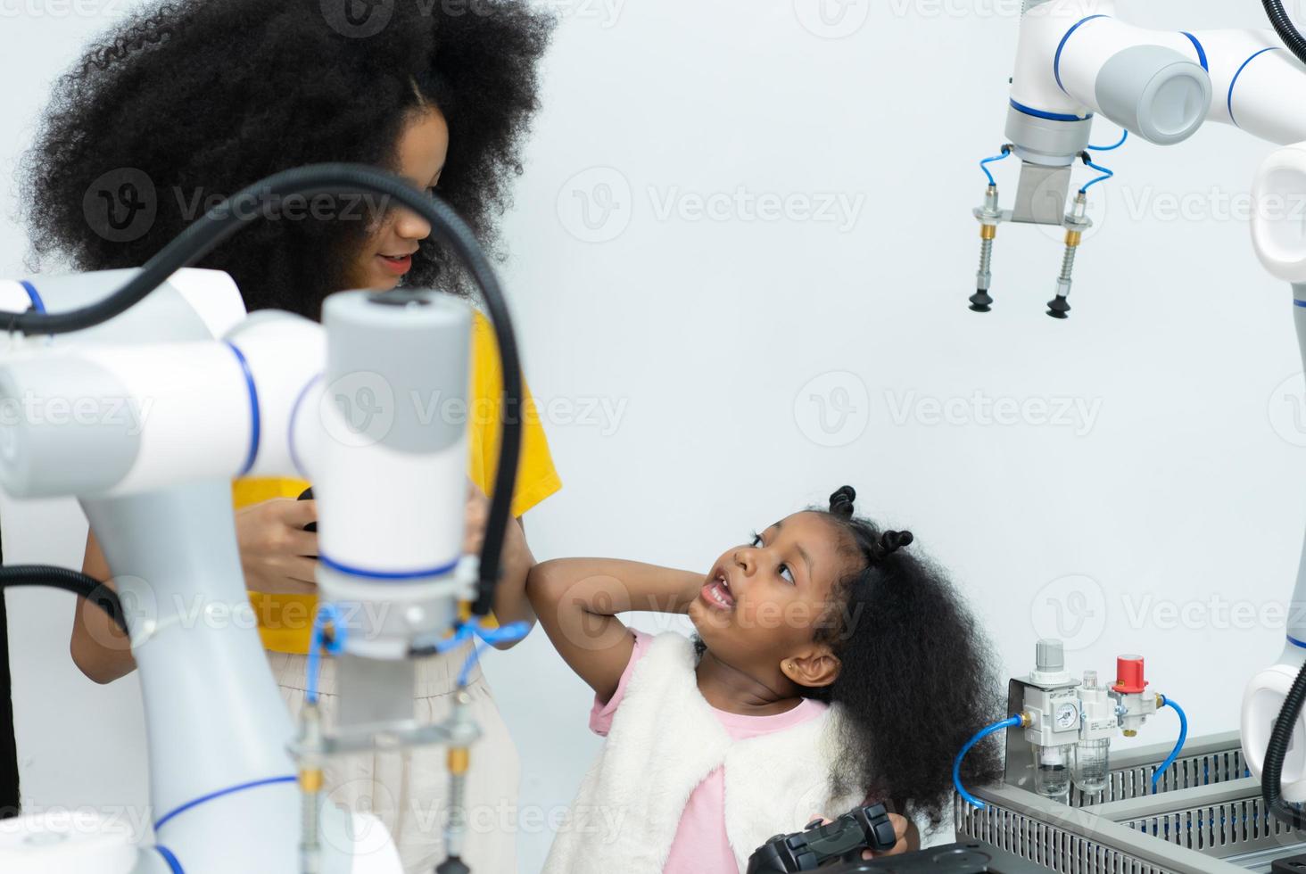 Children using the hand robot technology, Students are studying technology, which is one of the STEM courses. photo