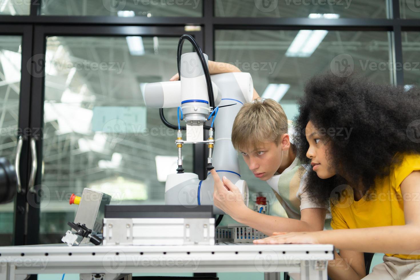 Children using the hand robot technology, Students are studying technology, which is one of the STEM courses. photo