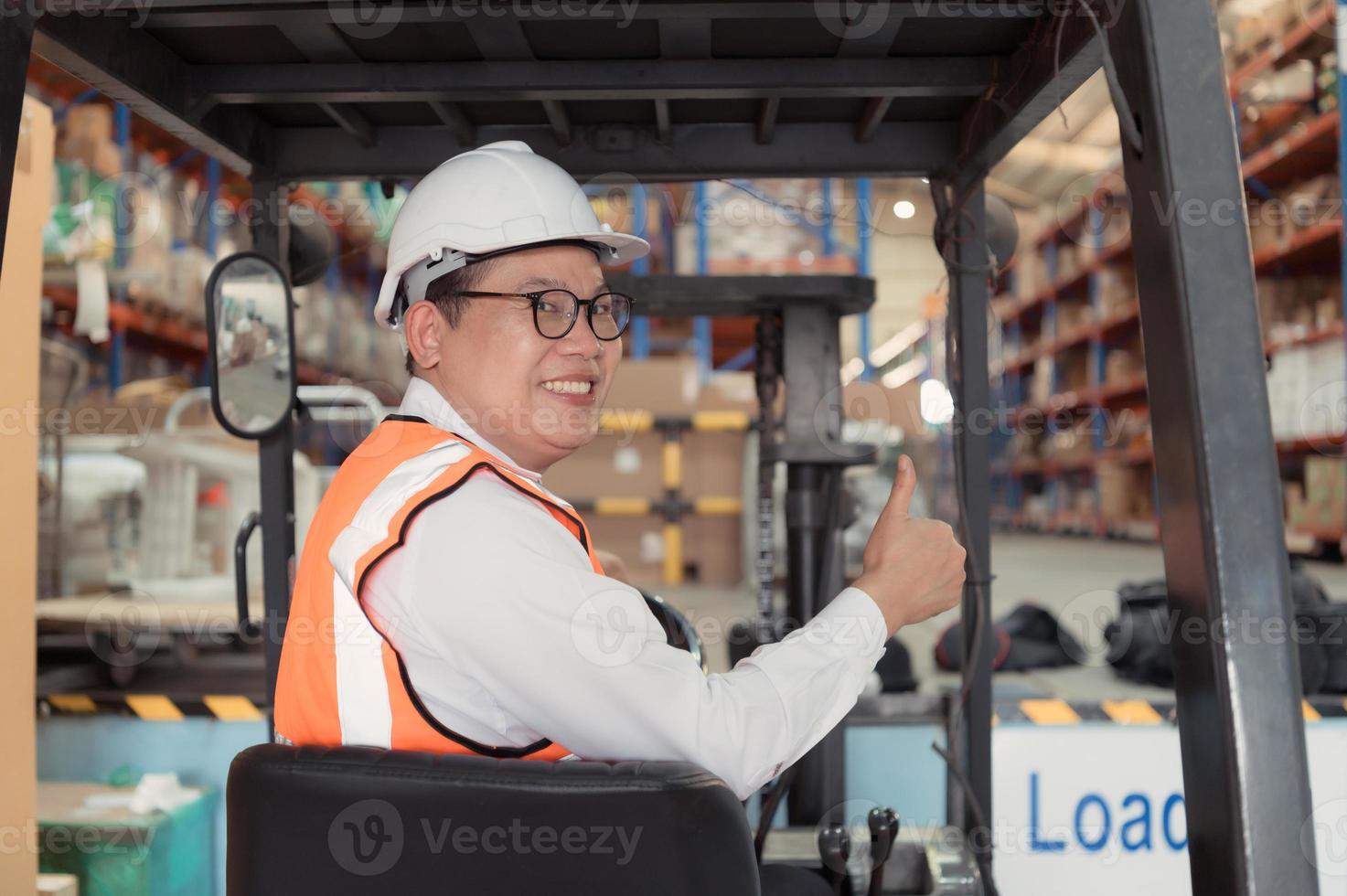 Warehouse manager Examine the equipment used to move goods in the warehouse and test drive a forklift. photo