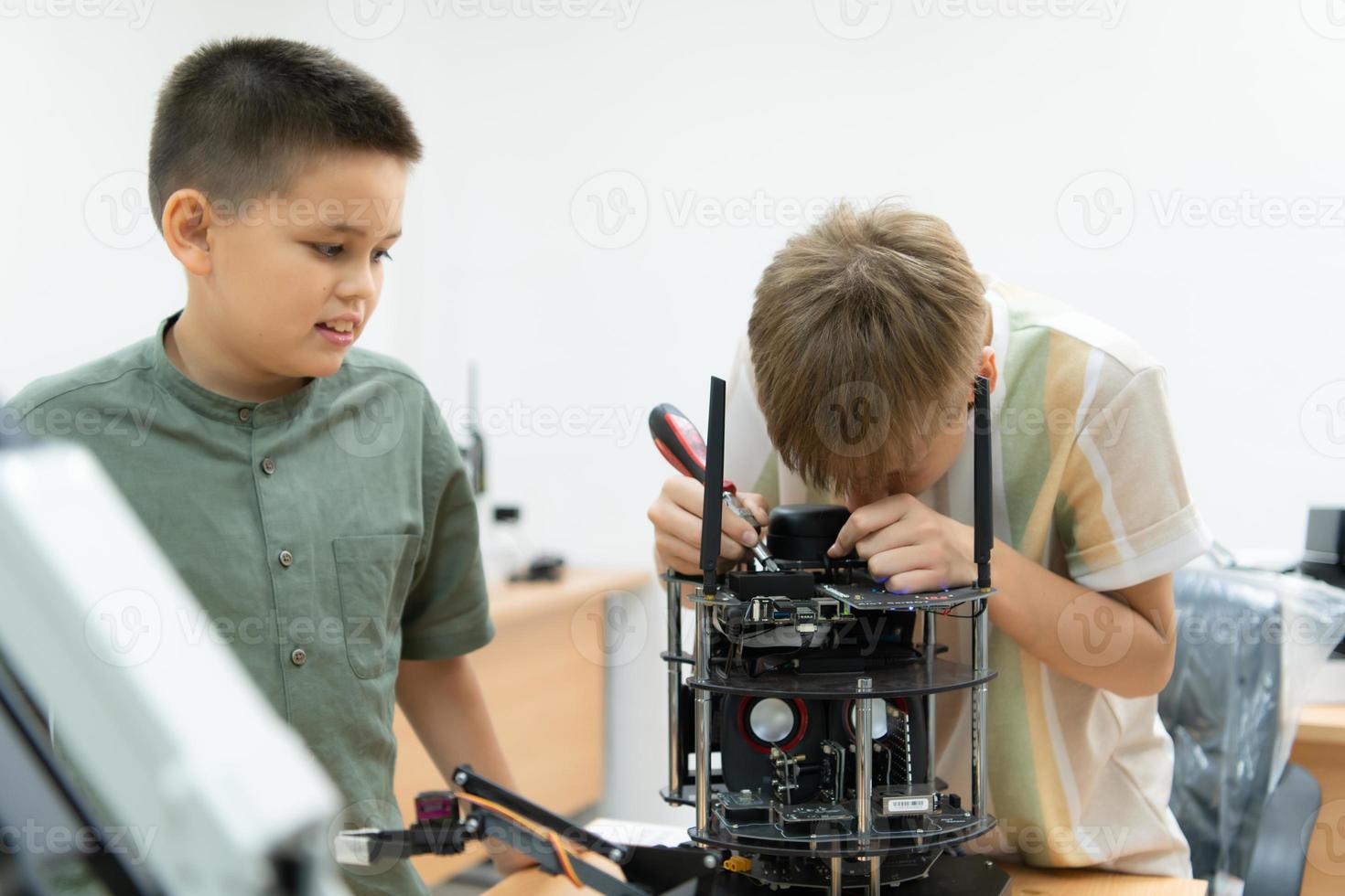 Children using the hand robot technology, Students are studying technology, which is one of the STEM courses. photo