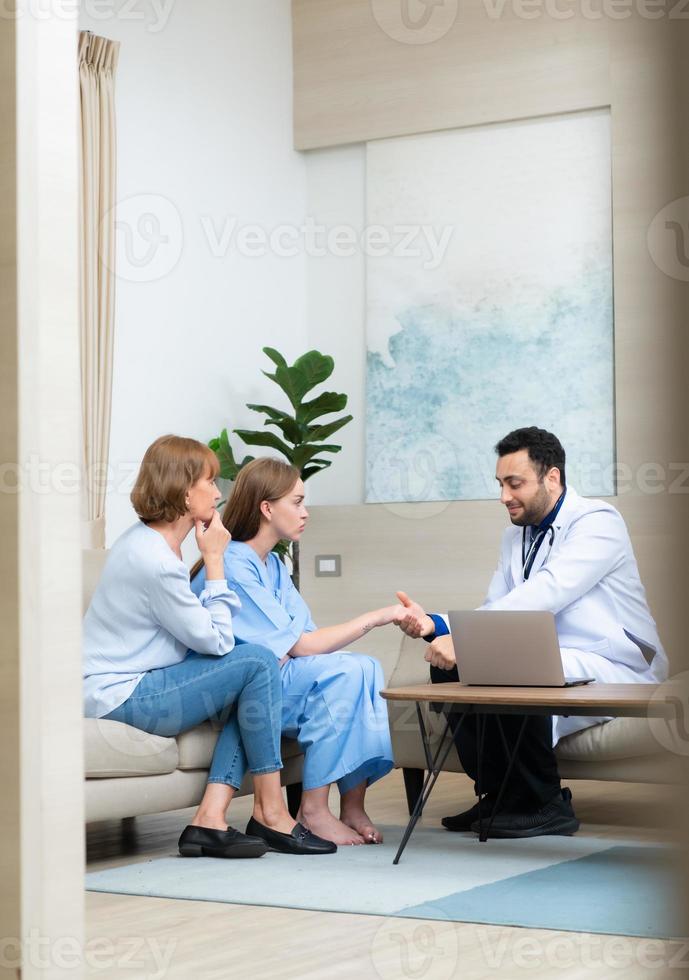 Her mother and the doctor had a conversation about the daughter's severe illness. to be informed of the treatment's status and future treatment options photo
