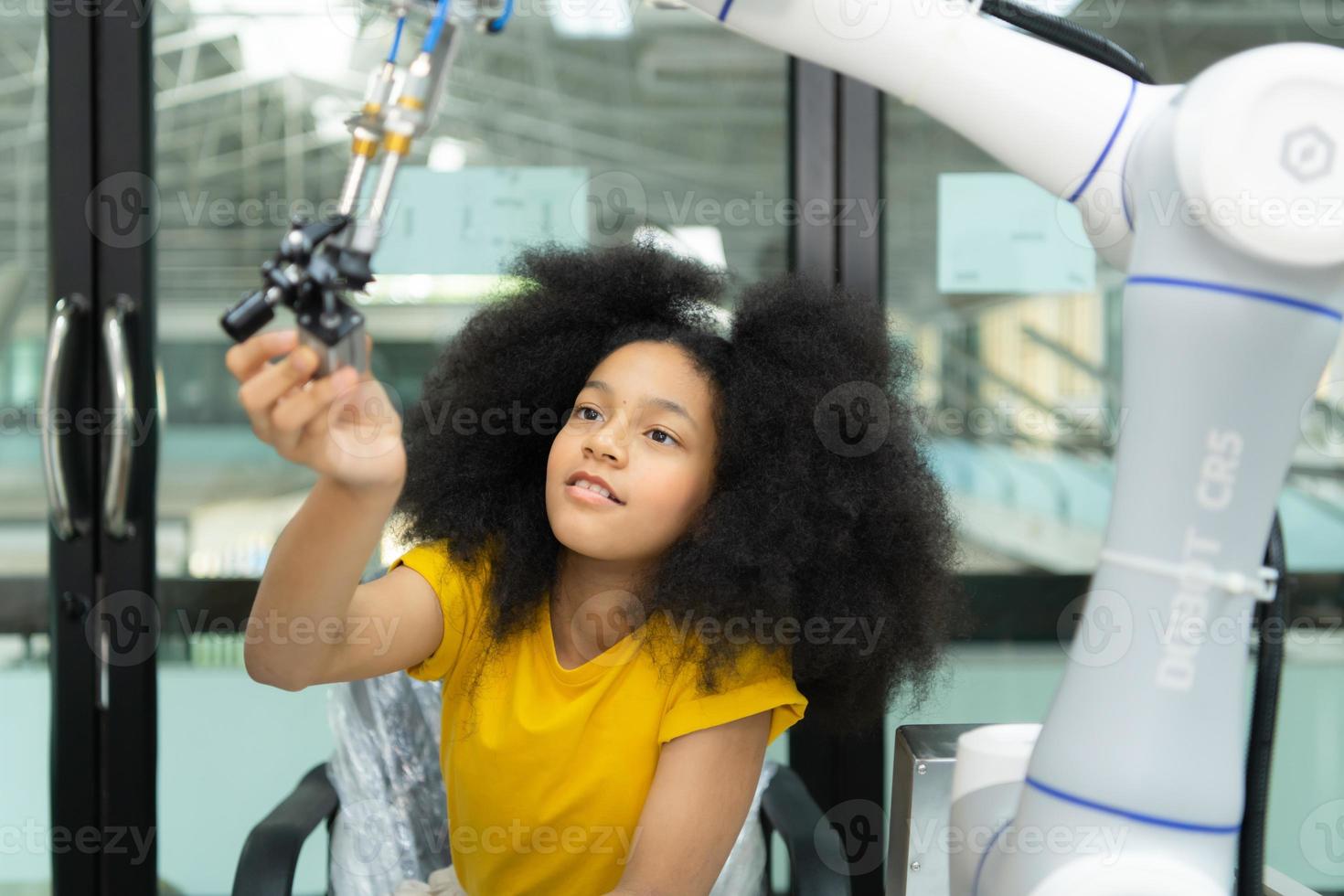 Children using the hand robot technology, Students are studying technology, which is one of the STEM courses. photo