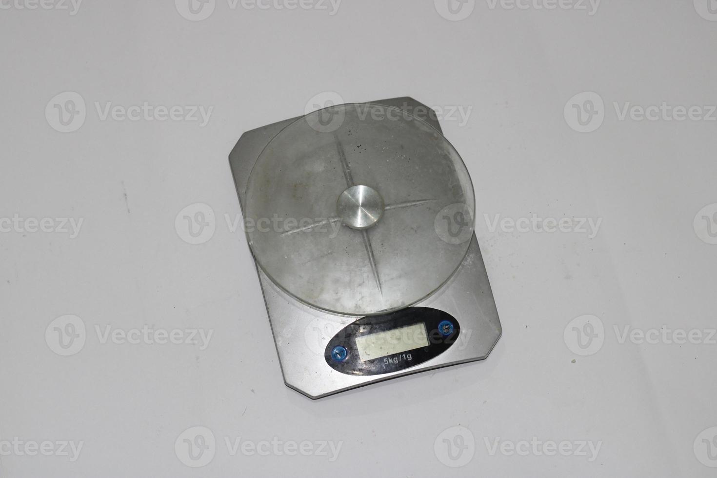 Photo of a digital scale with a white background