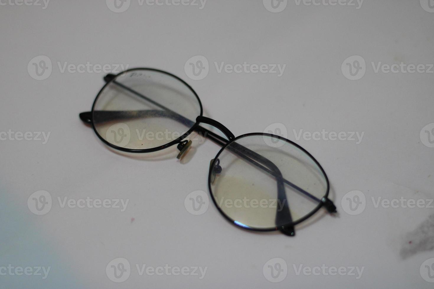 Photo of modern glasses with white background