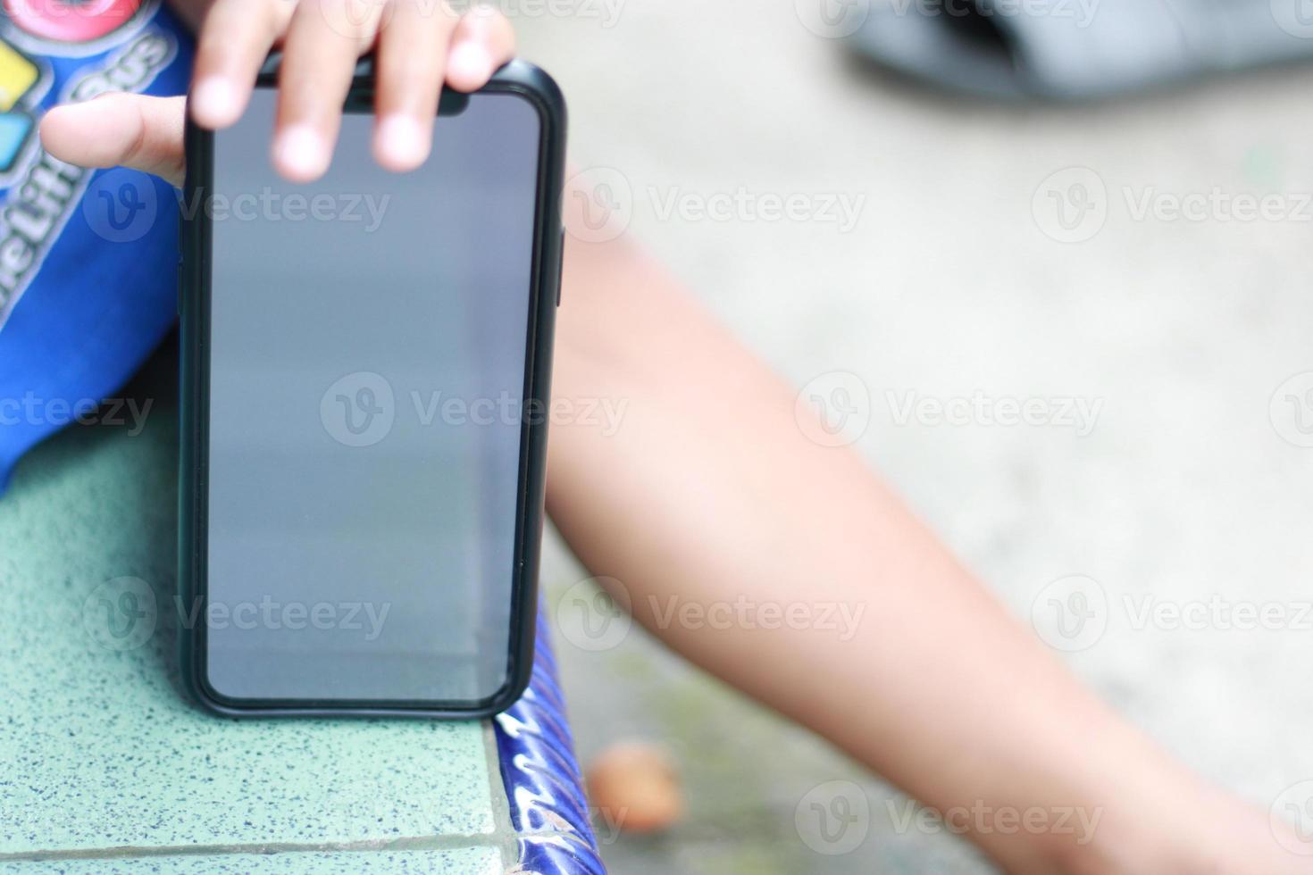 Photo of an empty cell phone held in hand