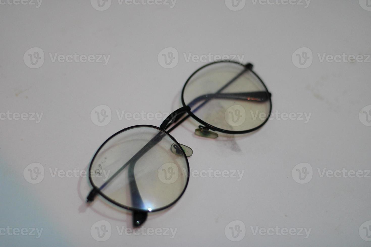 Photo of modern glasses with white background