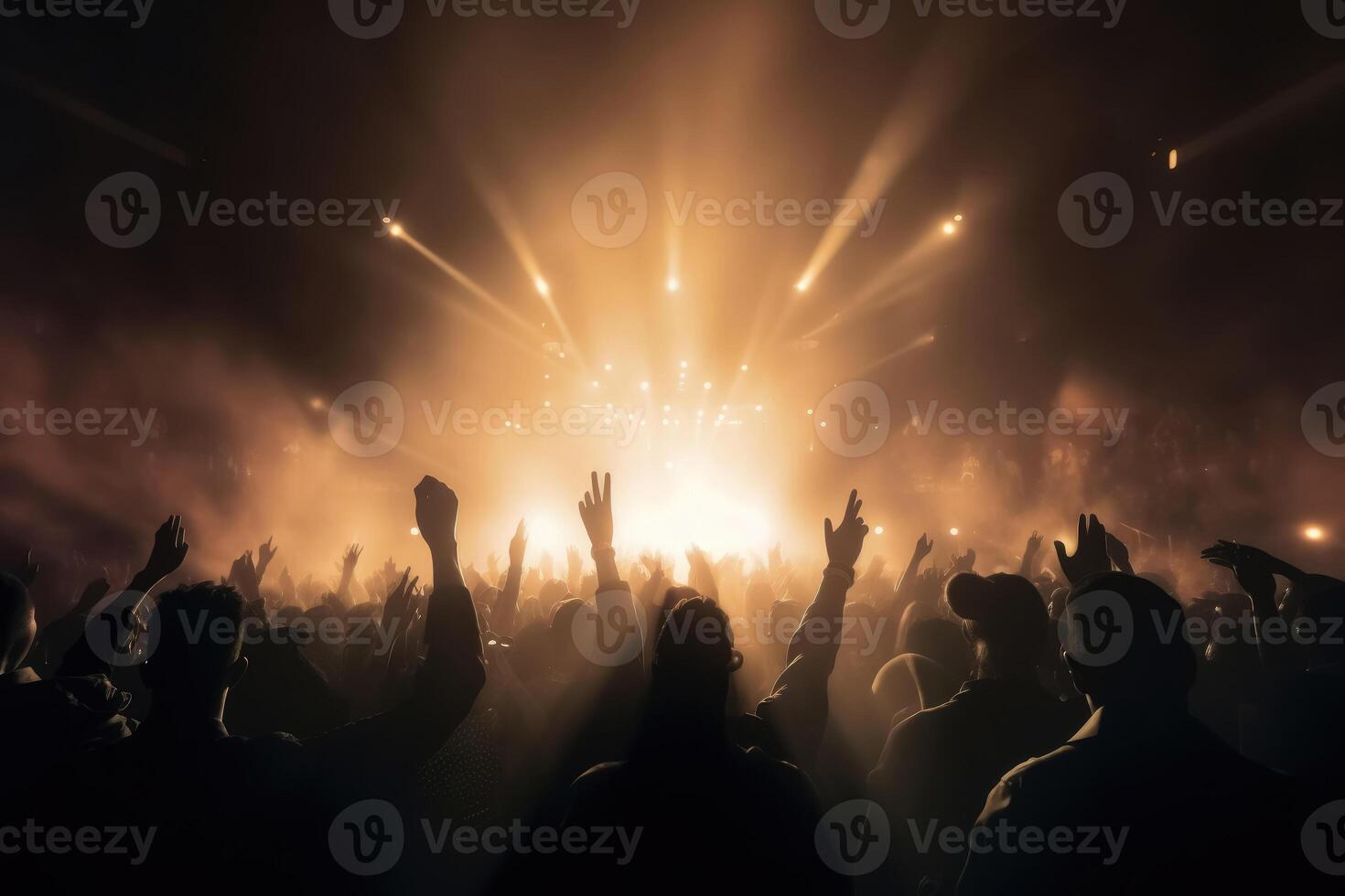 Black silhouette of a huge crowd of cheering people in front of a rock stage with soft bokeh lights created with technology. photo