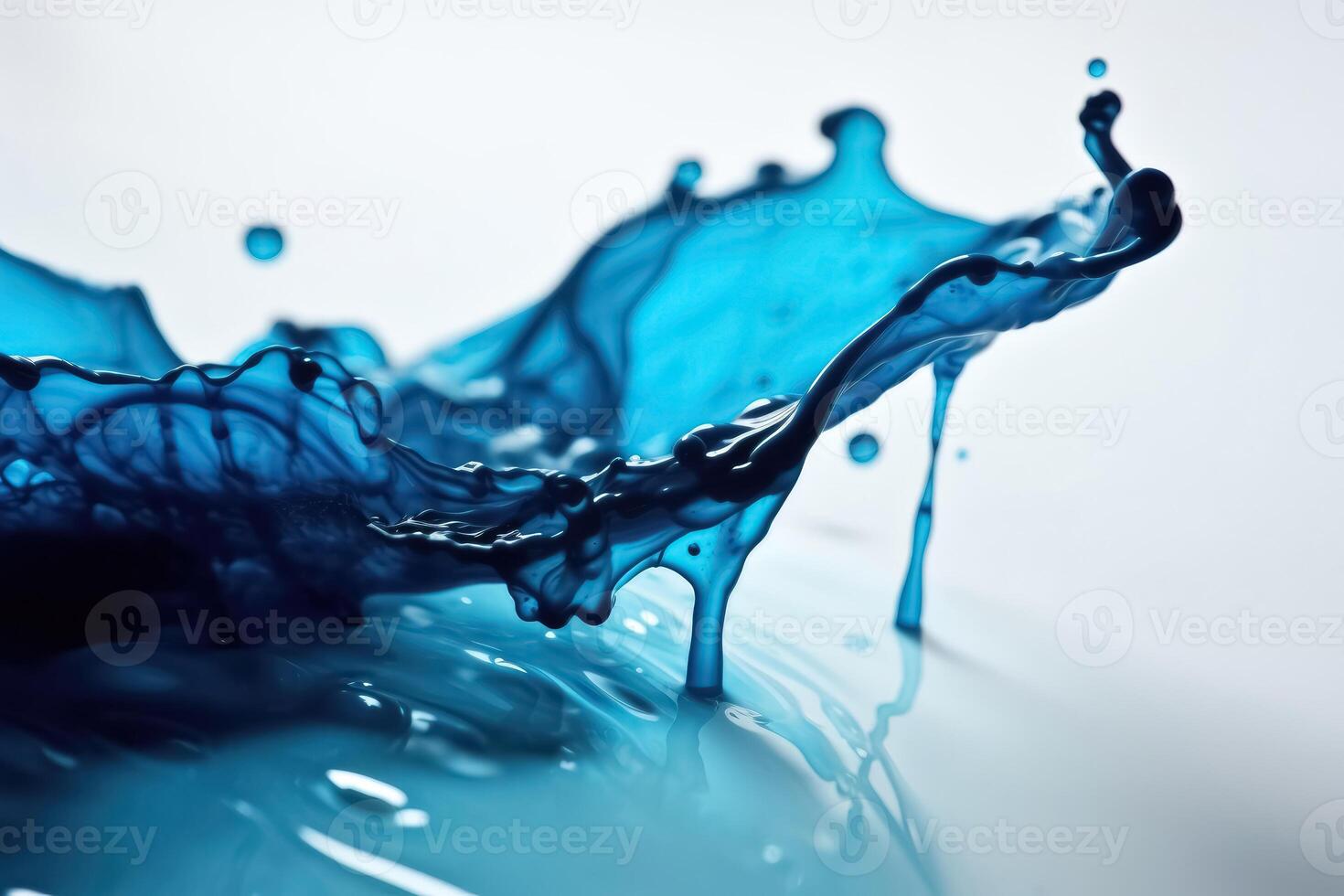 Blue ink dripping into water created with technology. photo