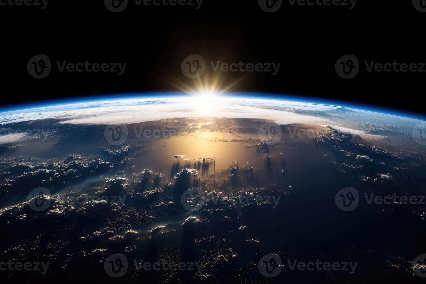 The rising sun above the earth as seen from space created with technology. photo