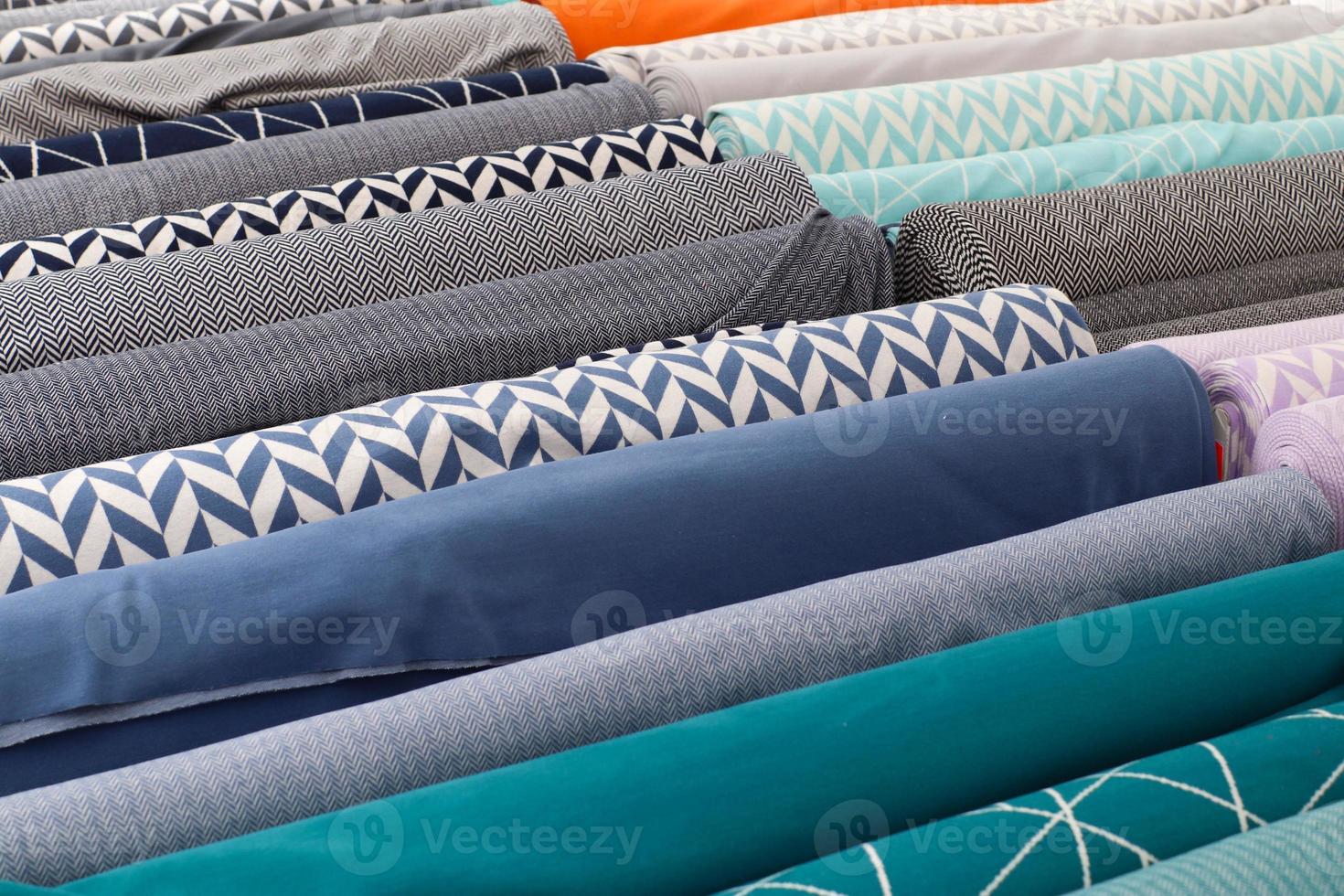 Samples of cloth and fabrics in different colors found at a fabrics market in Germany photo