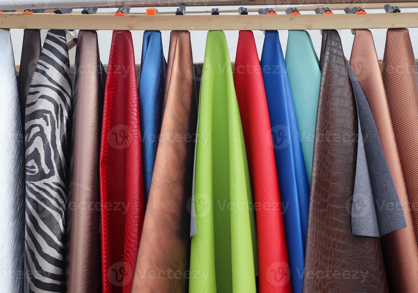 Samples of cloth and fabrics in different colors found at a fabrics market in Germany photo
