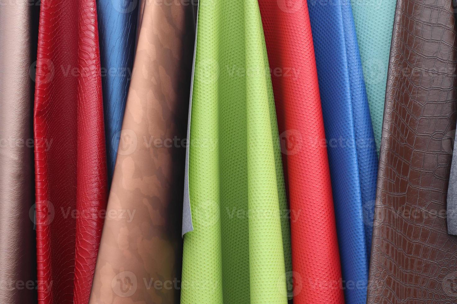 Samples of cloth and fabrics in different colors found at a fabrics market in Germany photo
