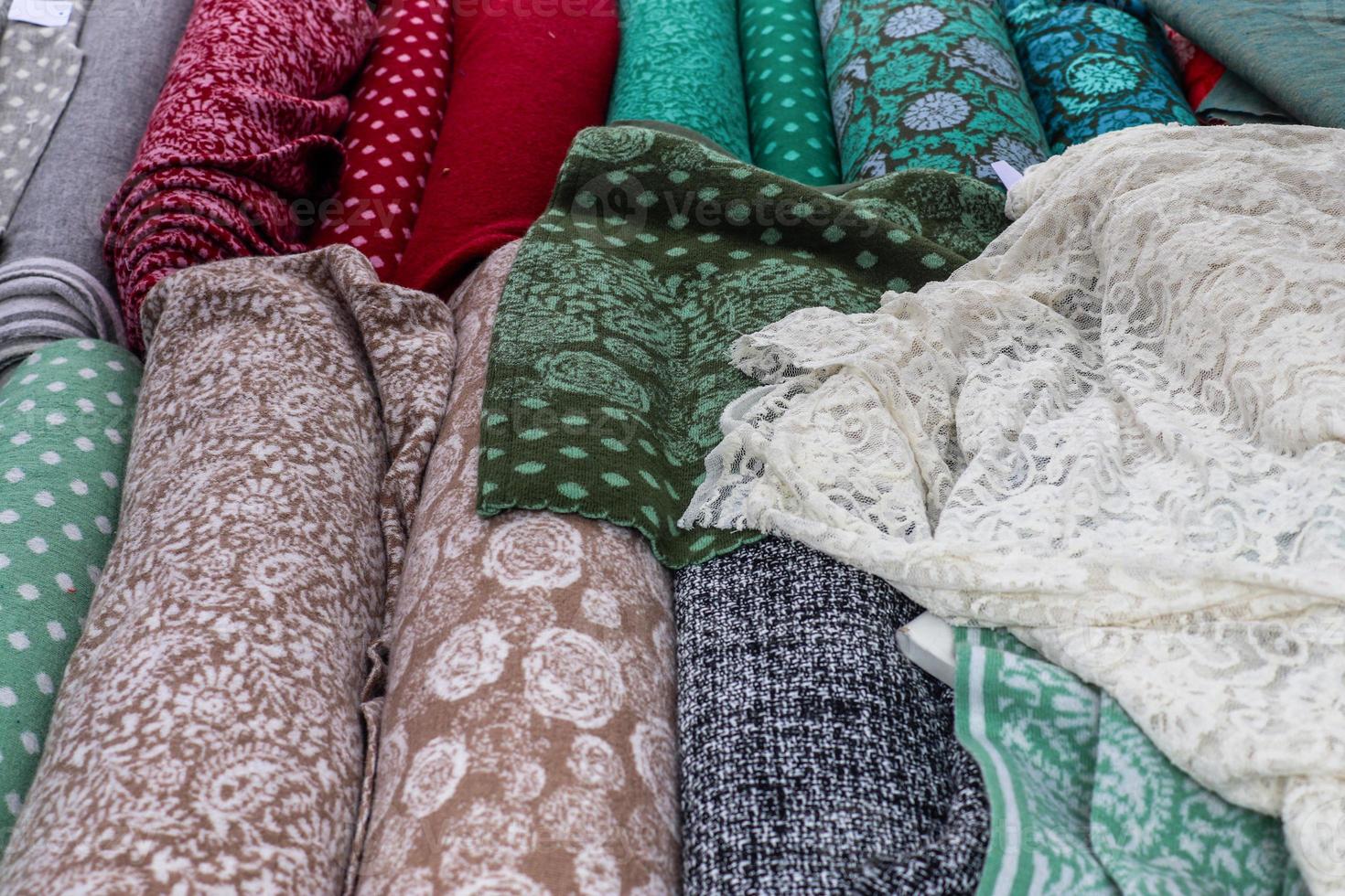 Samples of cloth and fabrics in different colors found at a fabrics market in Germany photo