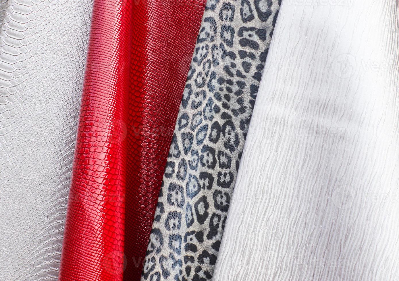 Samples of cloth and fabrics in different colors found at a fabrics market in Germany photo
