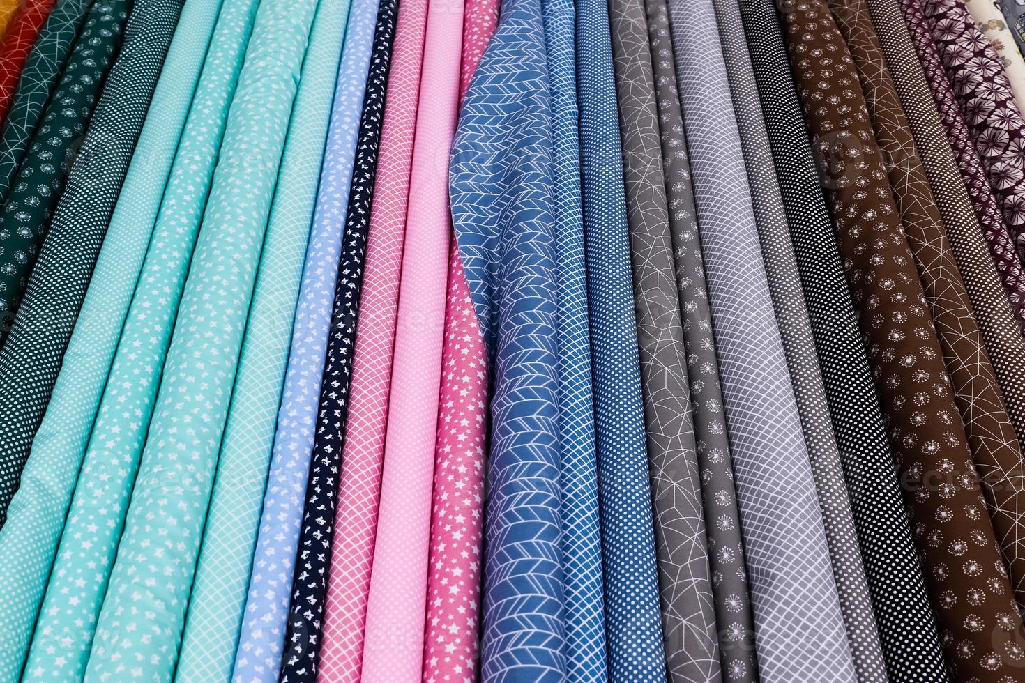 Samples of cloth and fabrics in different colors found at a fabrics market in Germany photo