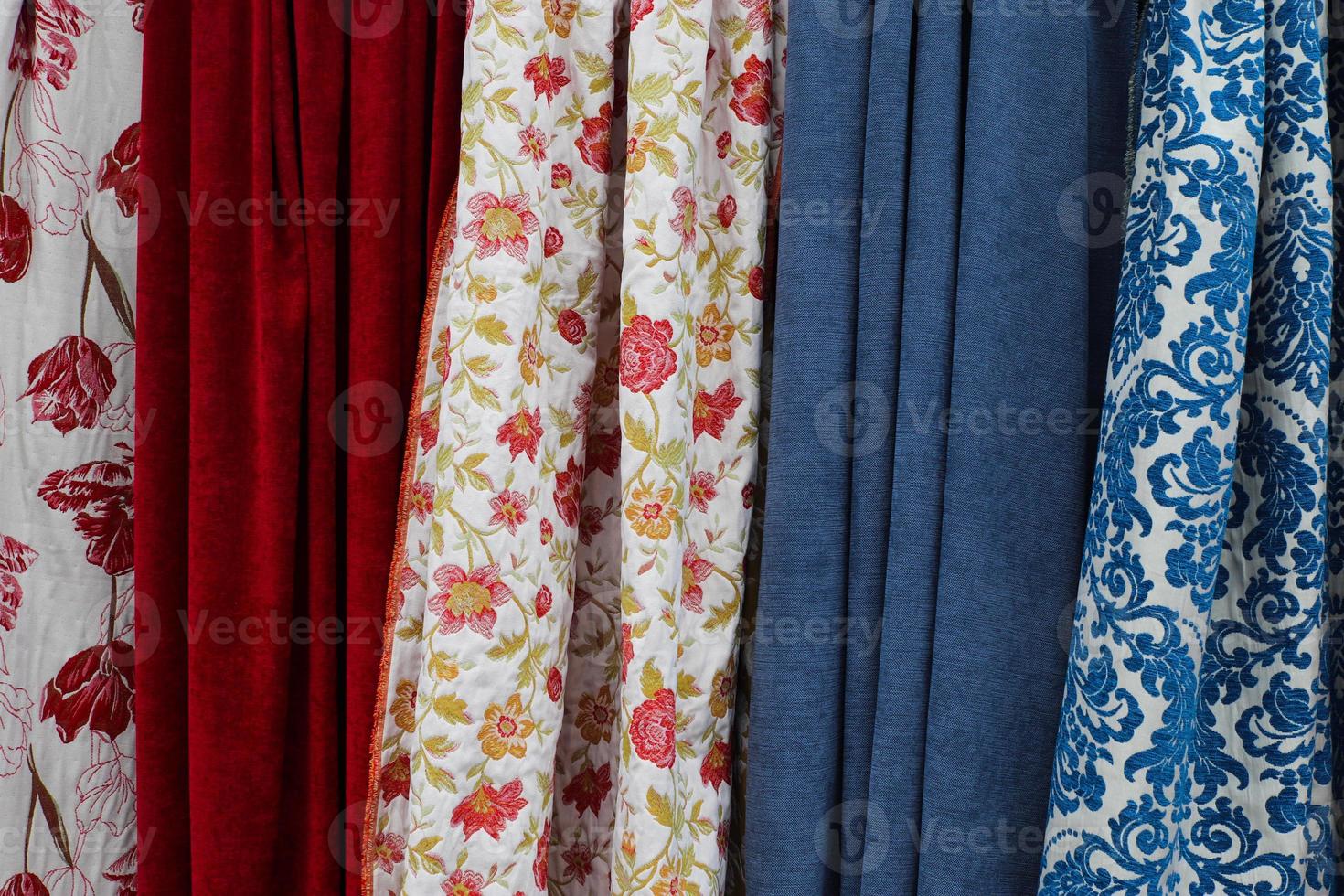 Samples of cloth and fabrics in different colors found at a fabrics market in Germany photo