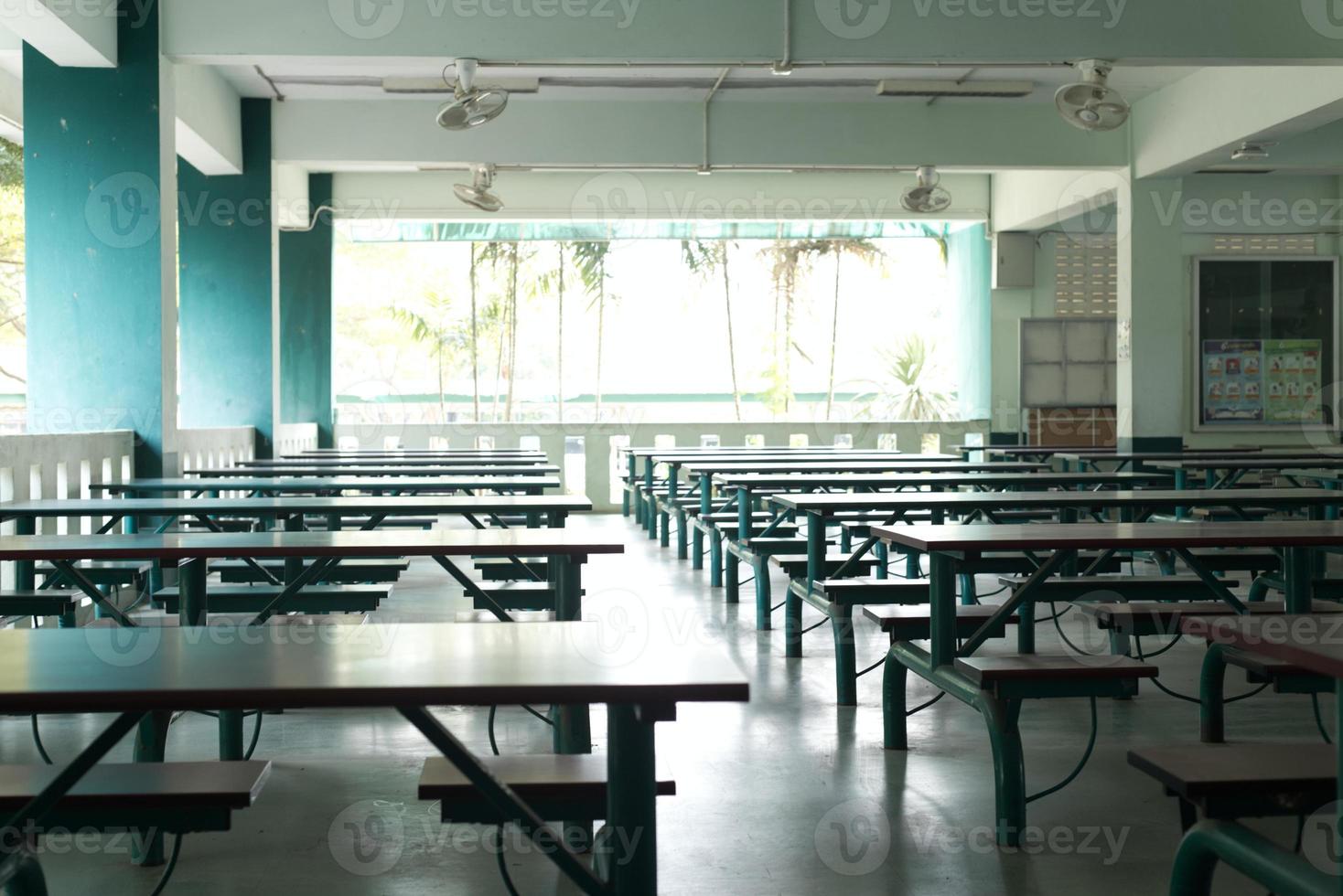 empty school cafeteria , canteen under building photo