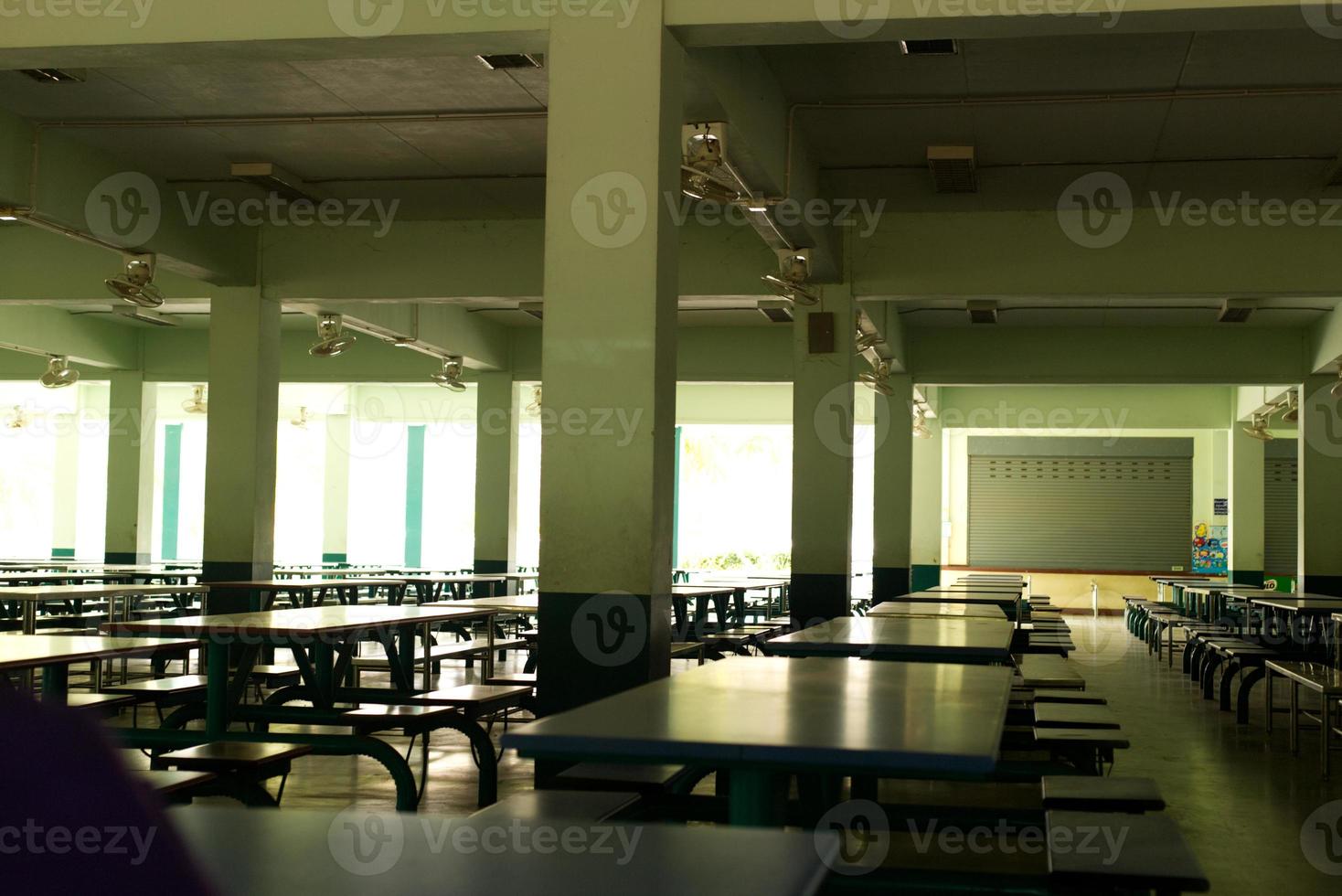 empty school cafeteria , canteen under building photo