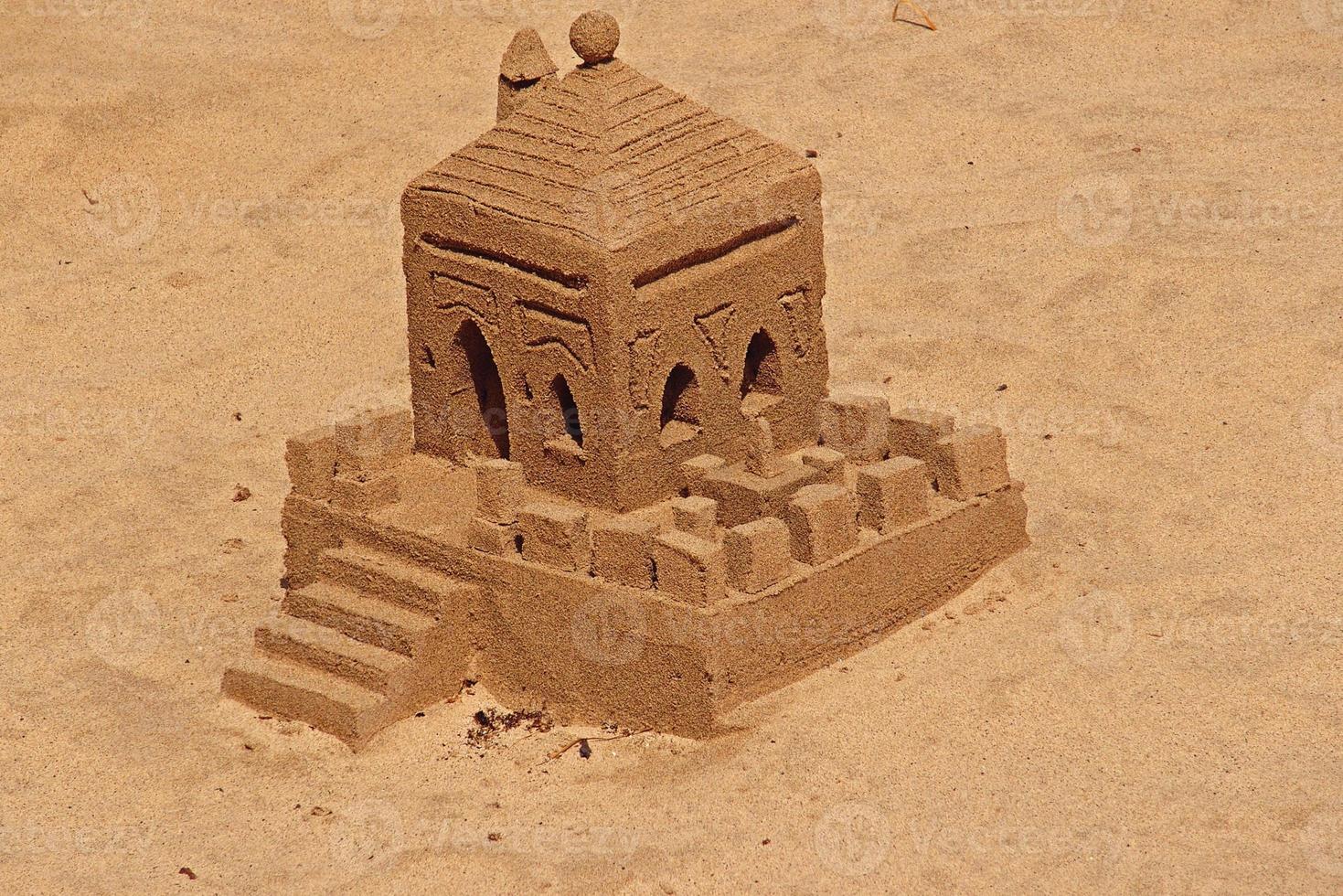 original sand structures on the beach on a beautiful warm sunny day by the ocean photo
